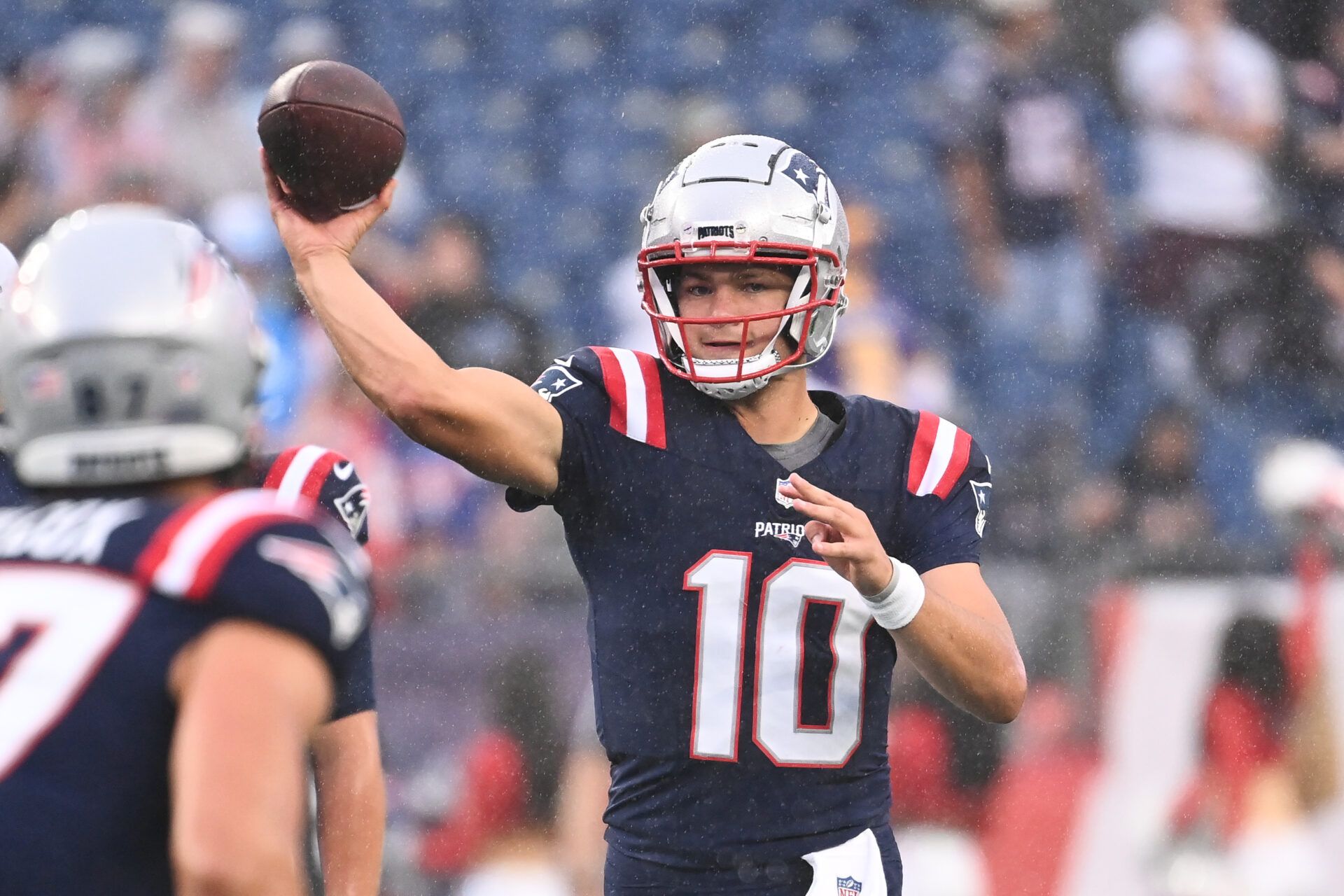 August 8, 2024; Foxborough, MA, USA; New England Patriots quarterback Drake Maye (10) warms up before a game against the Carolina Panthers at Gillette Stadium. Mandatory Credit: Eric Canha-USA TODAY Sports