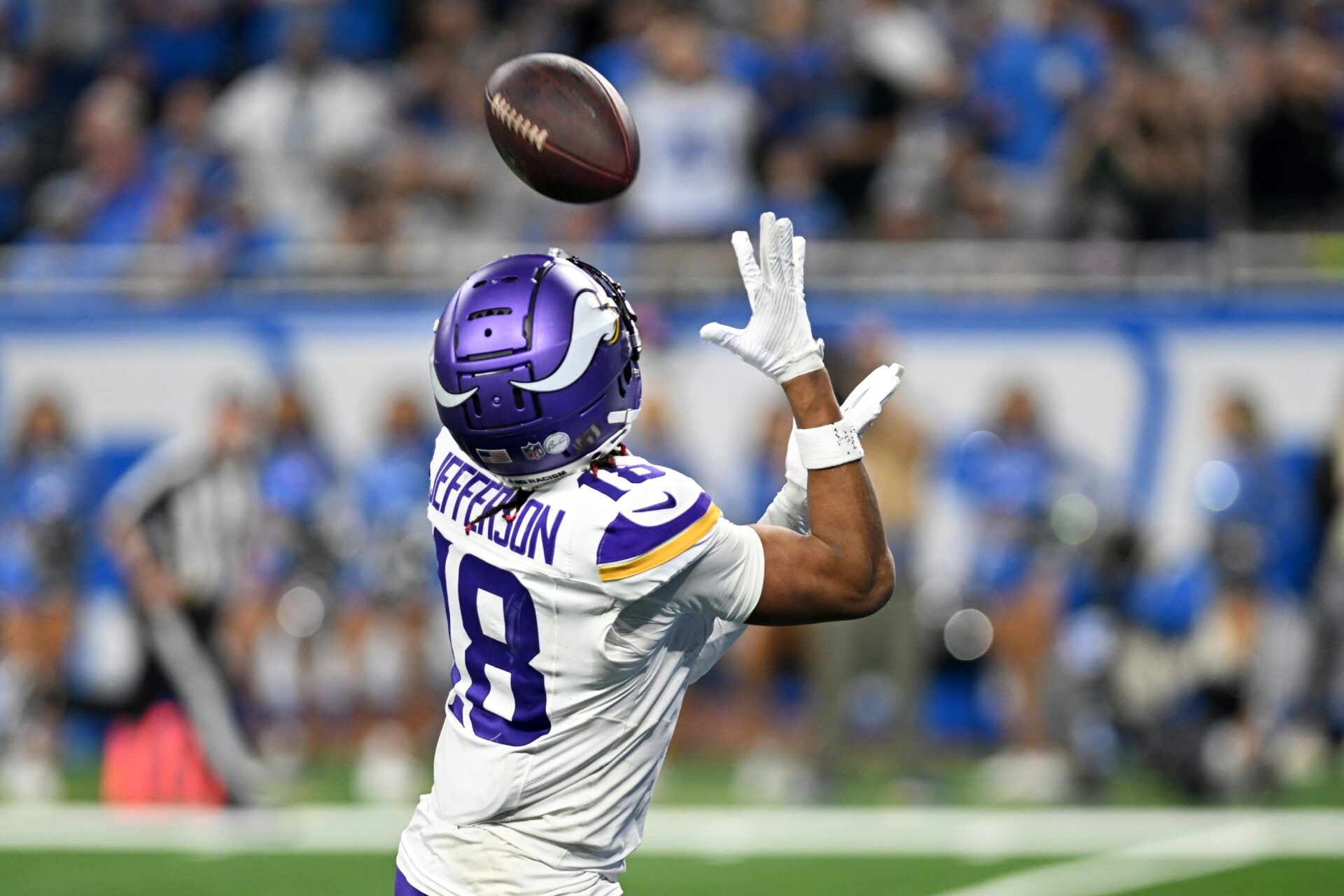 Minnesota Vikings WR Justin Jefferson (18) catches a pass for a touchdown against the Detroit Lions.