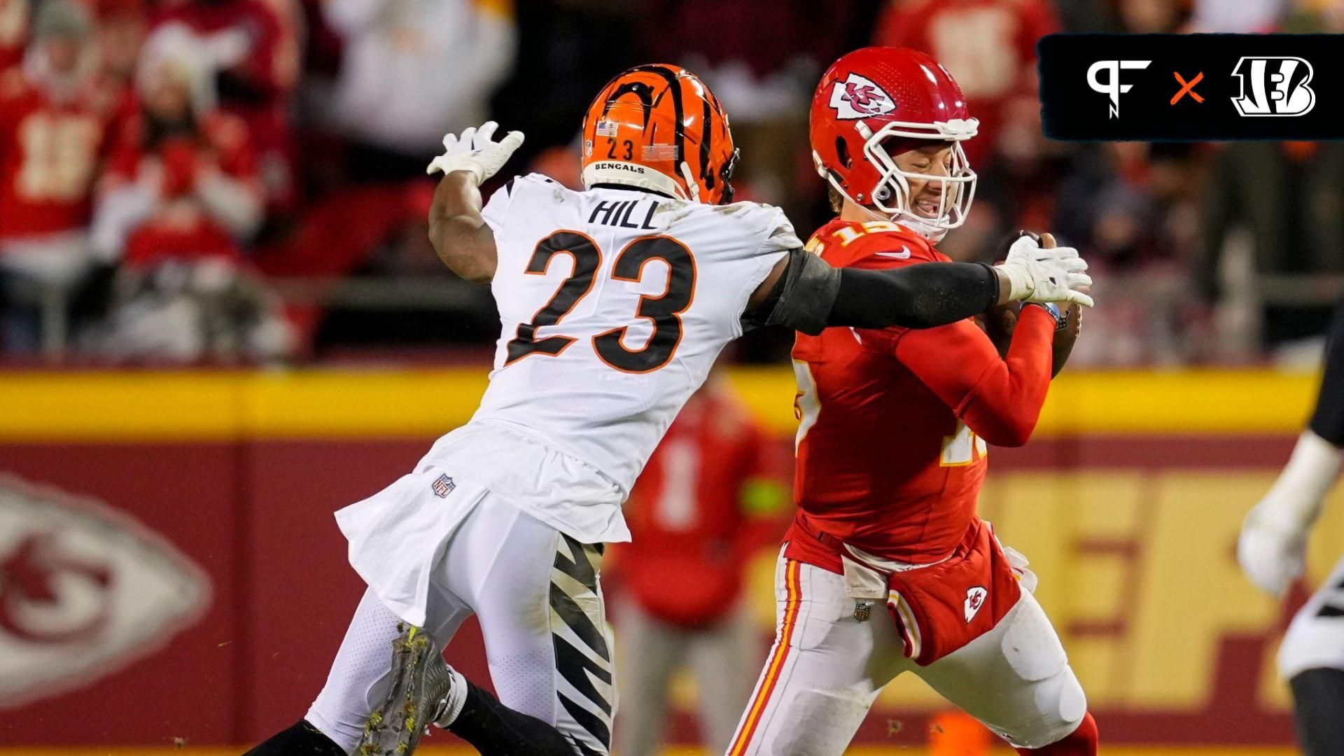 Kansas City Chiefs wide receiver Kadarius Toney (19) scrambles from Cincinnati Bengals safety Dax Hill (23) during the second half at GEHA Field at Arrowhead Stadium.