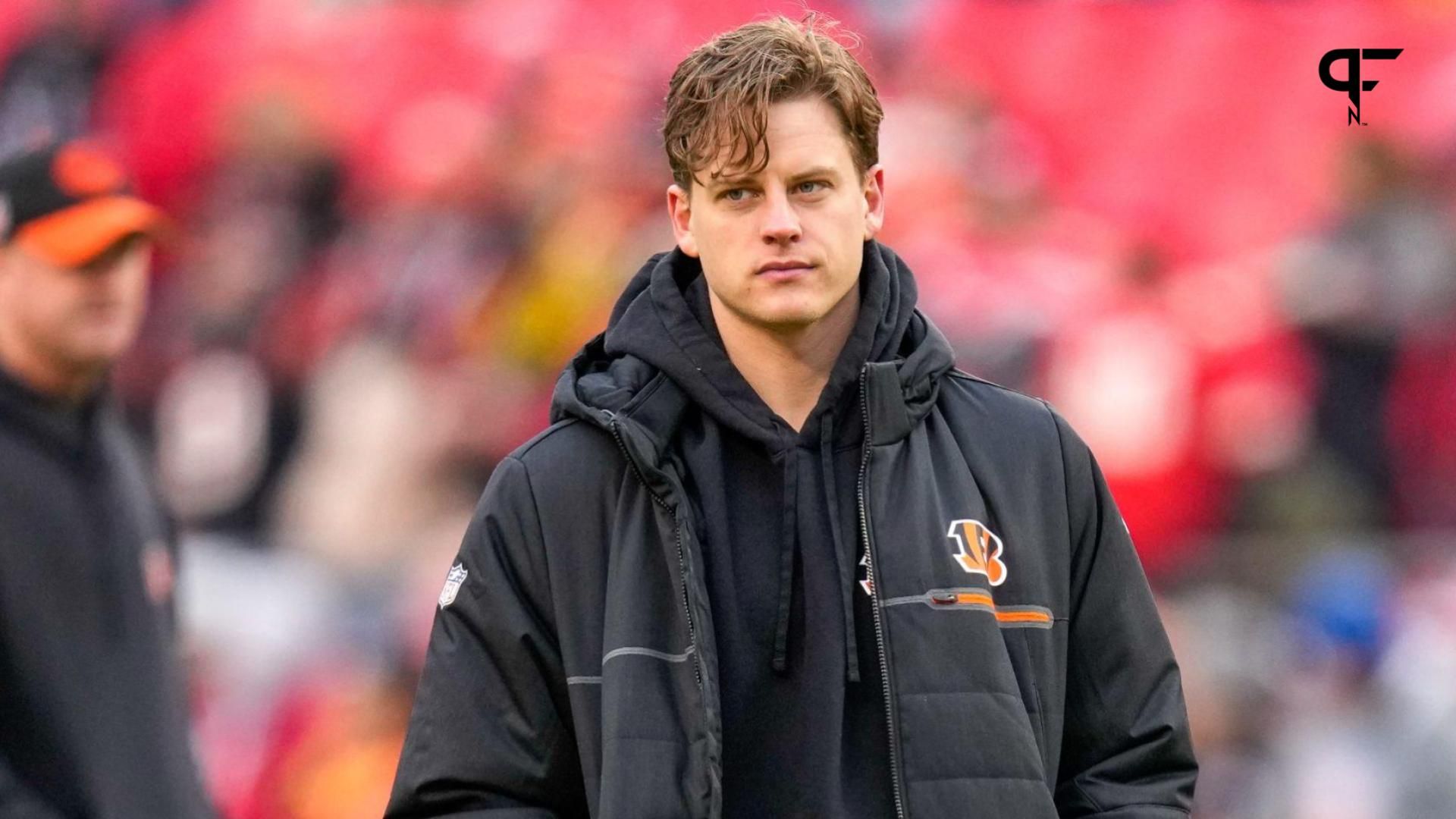 Injured Cincinnati Bengals quarterback Joe Burrow (9) walks the field before the first quarter of the NFL Week 17 game between the Kansas City Chiefs and the Cincinnati Bengals at Arrowhead Stadium in Kansas City, Mo., on Sunday, Dec. 31, 2023.