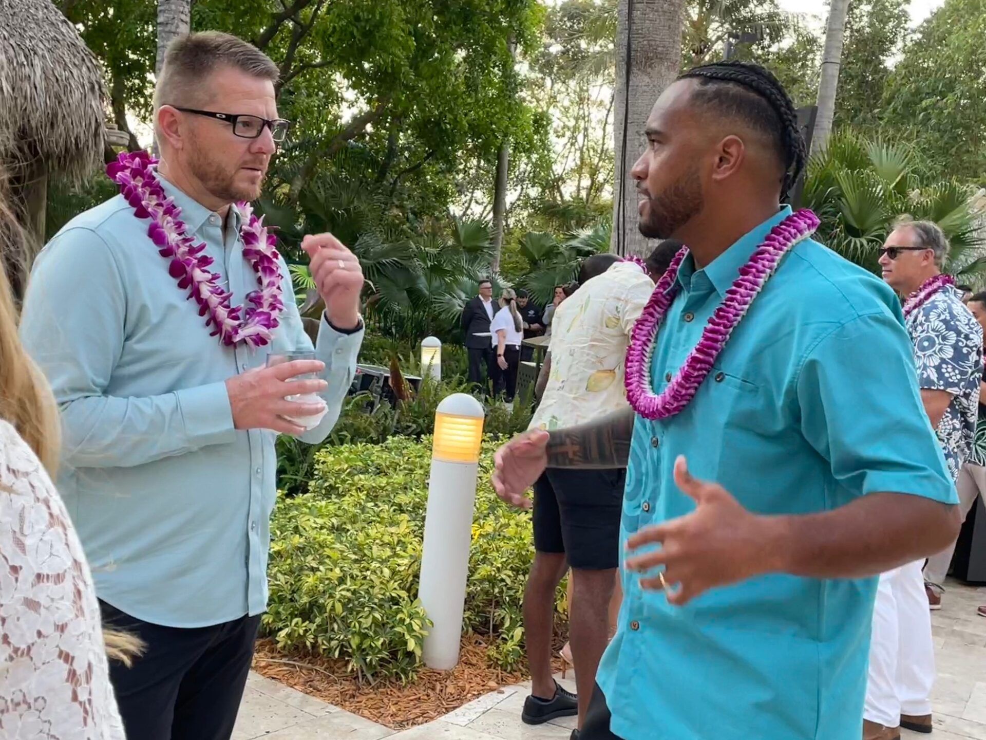 Dolphins QB Tua Tagovailoa talks football with a guest at the Luau with Tua on Thursday night at the Seminole Hard Rock Hotel & Casino.