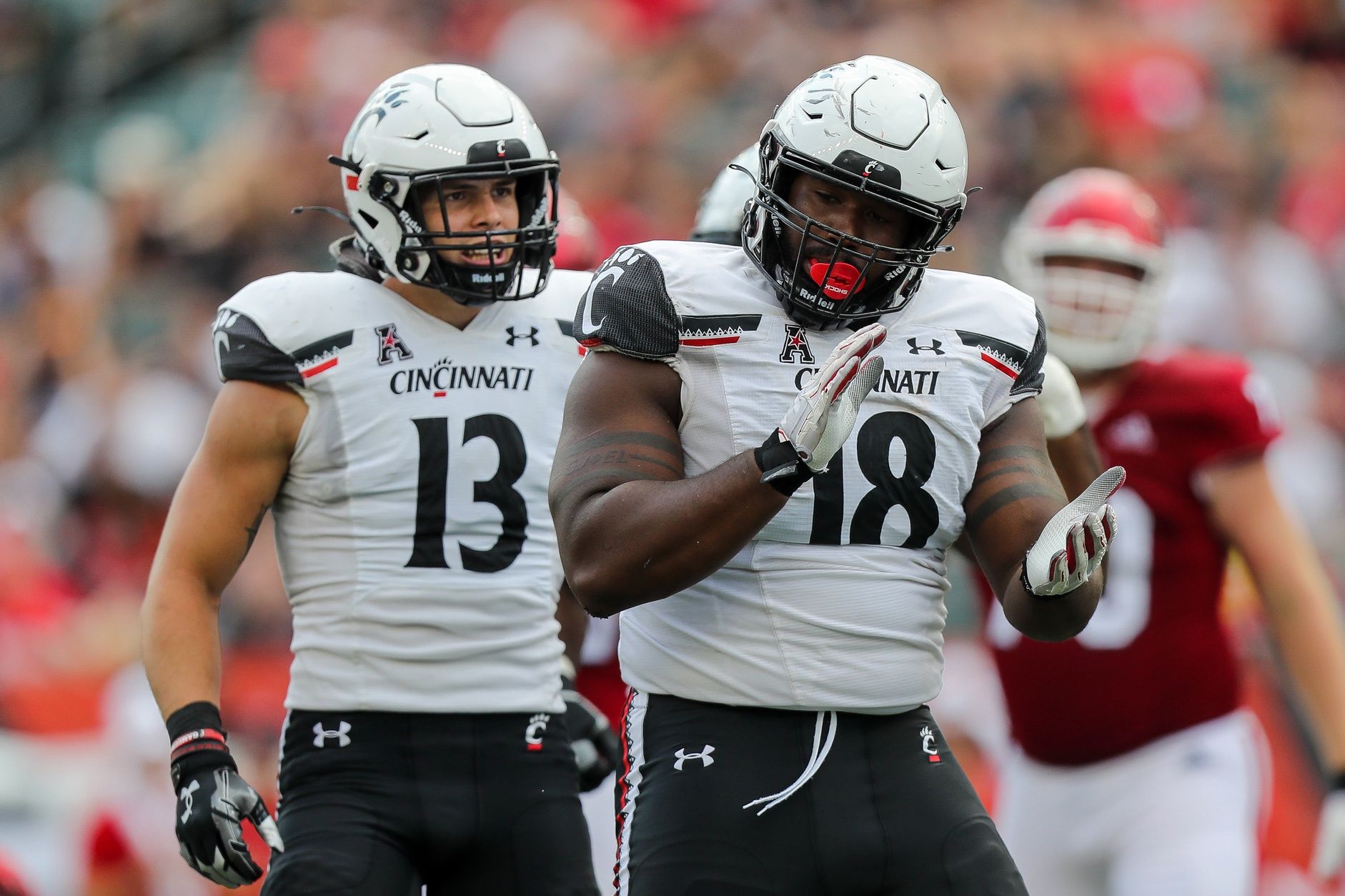 Sep 17, 2022; Cincinnati, Ohio, USA; Cincinnati Bearcats defensive lineman Jowon Briggs (18) reacts after a play against the Miami Redhawks in the second half at Paycor Stadium. Mandatory Credit: Katie Stratman-USA TODAY Sports