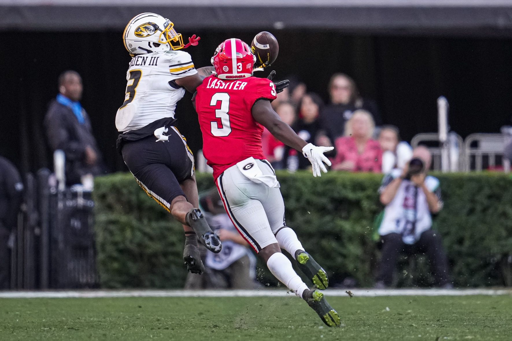 Georgia Bulldogs defensive back Kamari Lassiter (3) breaks up a pass intended for Missouri Tigers wide receiver Luther Burden III (3) during the second half at Sanford Stadium.