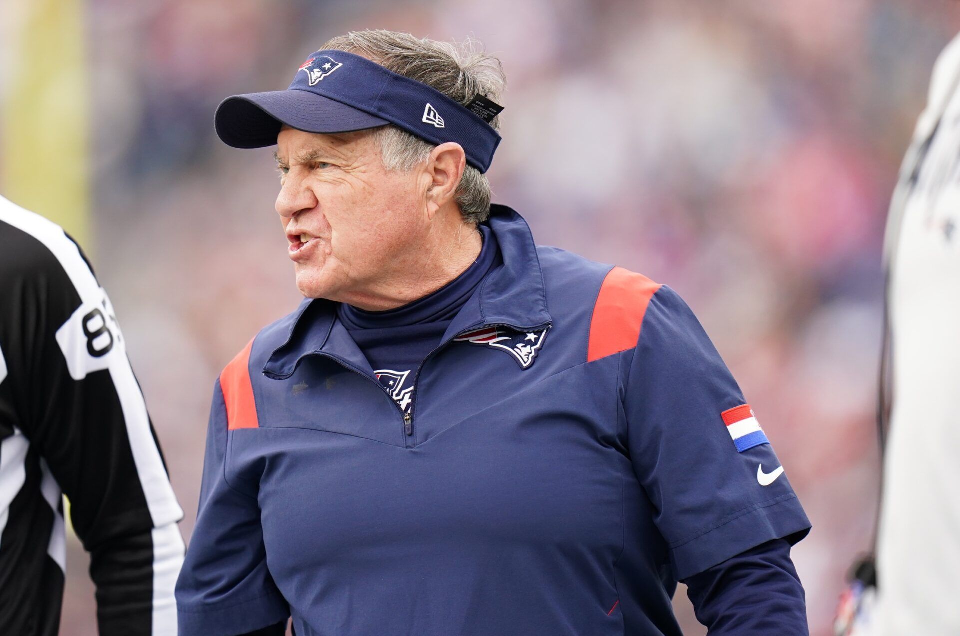 New England Patriots head coach Bill Belichick watches from the sideline as they take on the Miami Dolphins at Gillette Stadium.