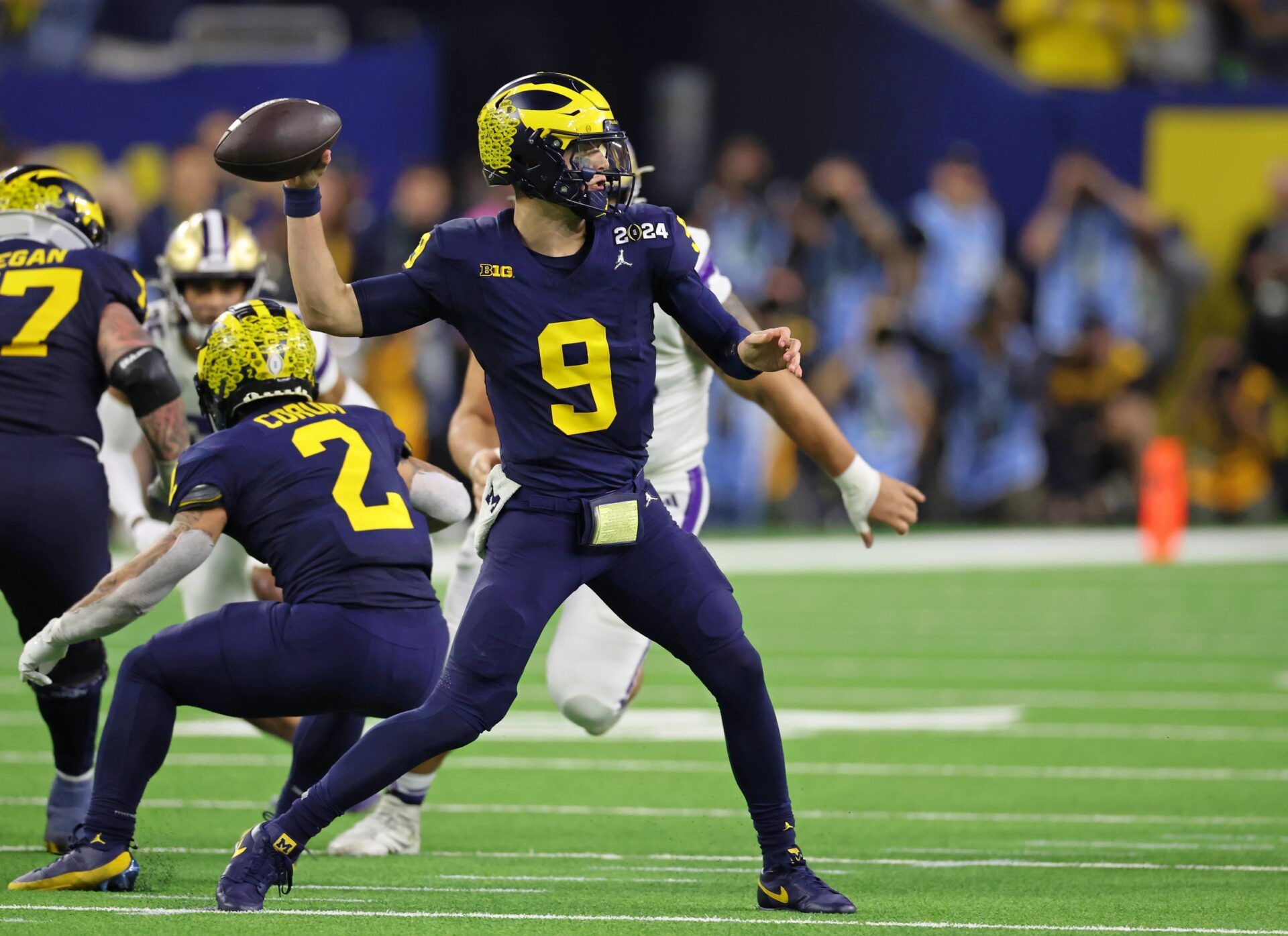 Michigan Wolverines quarterback J.J. McCarthy (9) passes the ball against the Washington Huskies during the third quarter in the 2024 College Football Playoff national championship game at NRG Stadium. Mandatory Credit: Thomas Shea-USA TODAY Sports