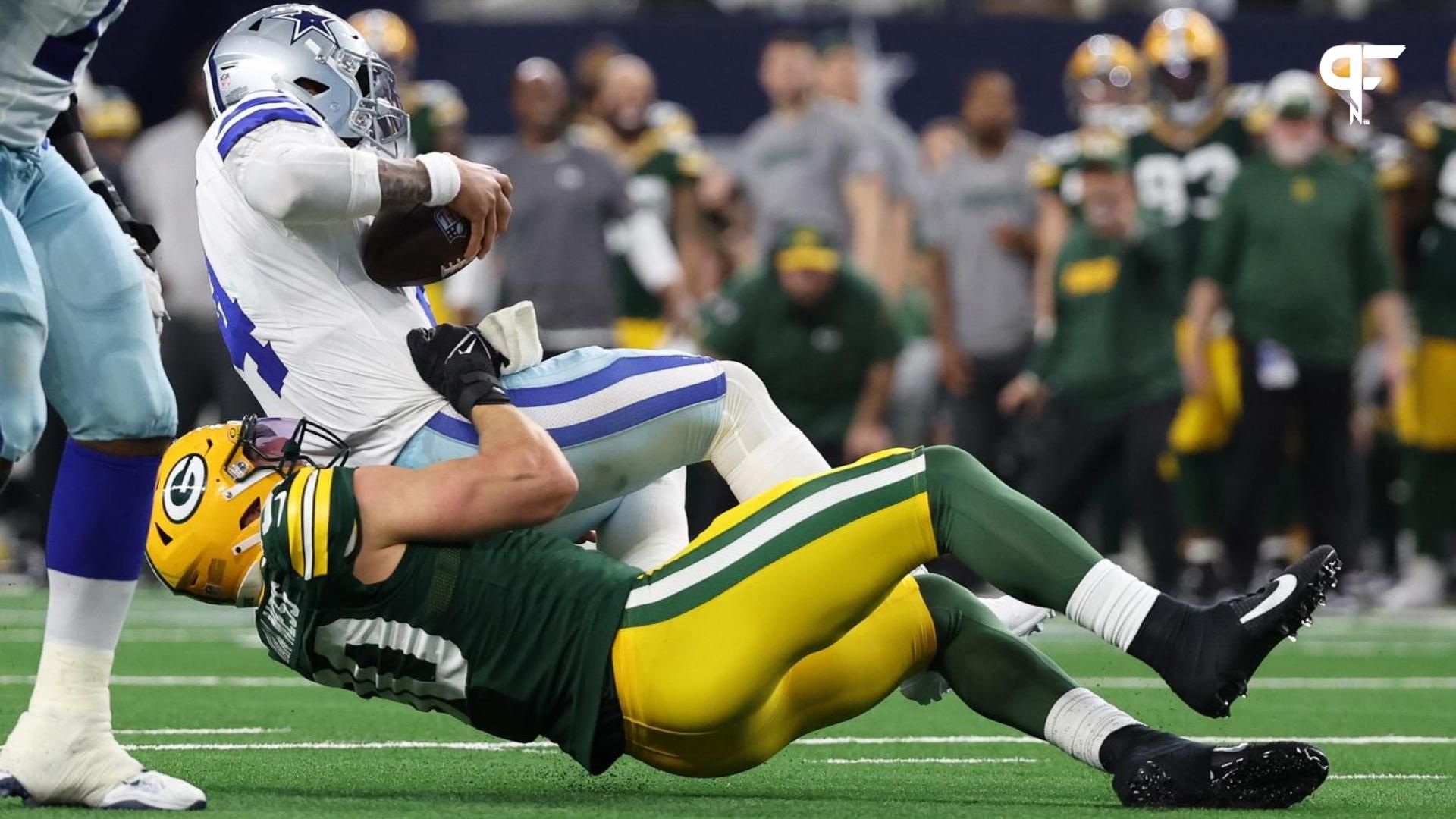 Green Bay Packers linebacker Lukas Van Ness (90) sacks Dallas Cowboys quarterback Dak Prescott (4) during the second half for the 2024 NFC wild card game at AT&T Stadium.