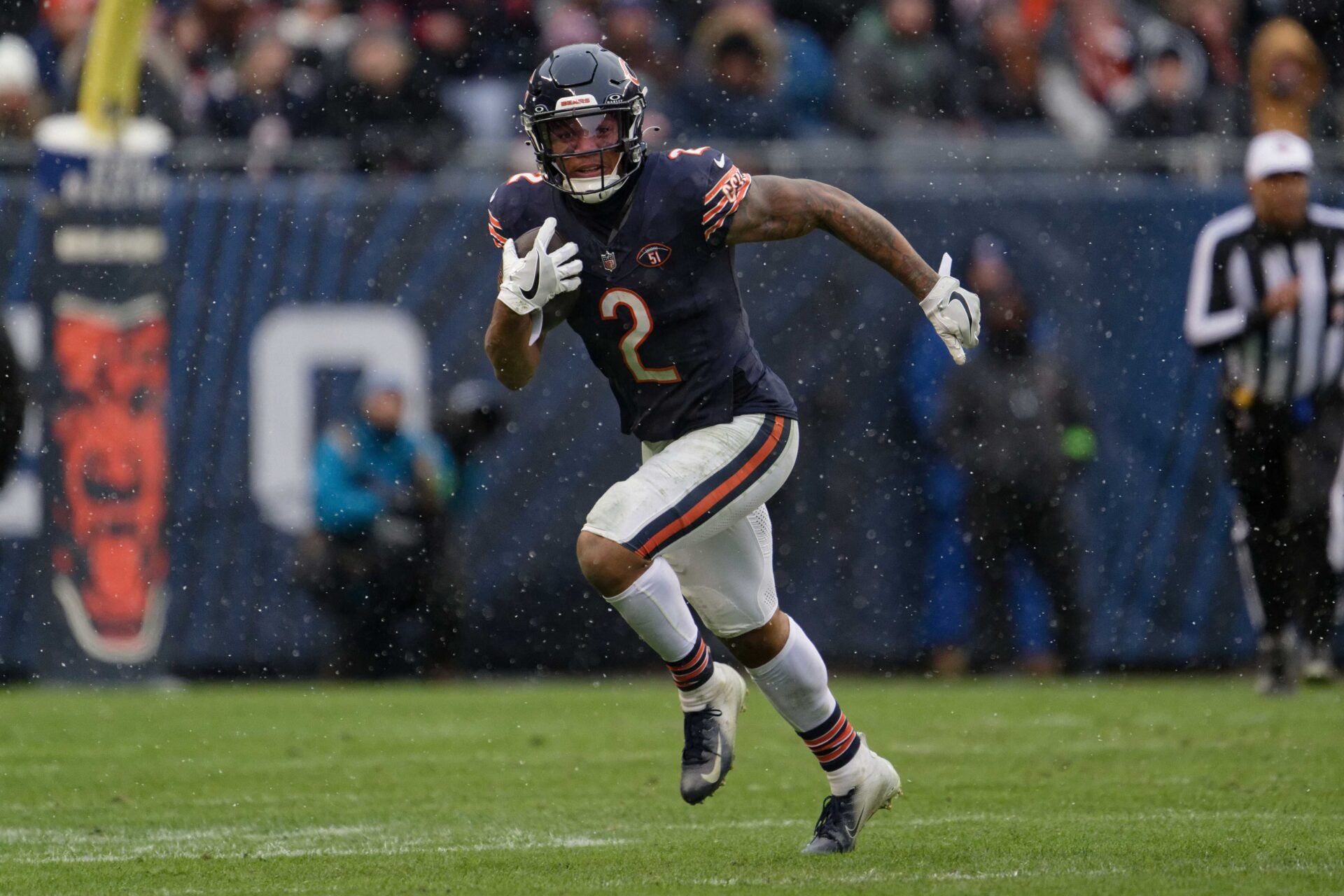 Chicago Bears wide receiver DJ Moore (2) runs with the ball against the Atlanta Falcons at Soldier Field. Mandatory Credit: Jamie Sabau-USA TODAY Sports