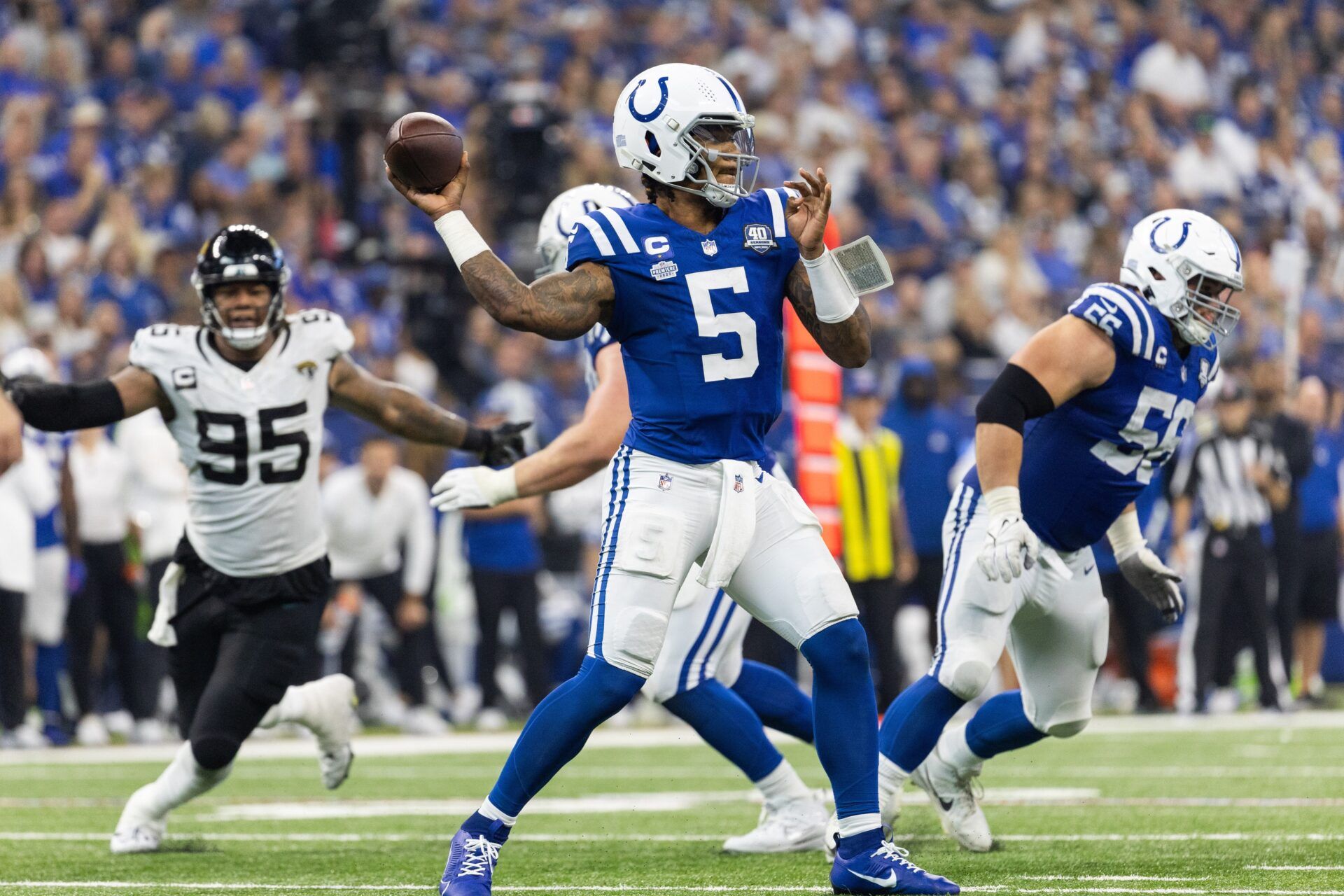 Indianapolis Colts quarterback Anthony Richardson (5) passes the ball in the second half against the Jacksonville Jaguars at Lucas Oil Stadium. Mandatory Credit: Trevor Ruszkowski-USA TODAY Sports