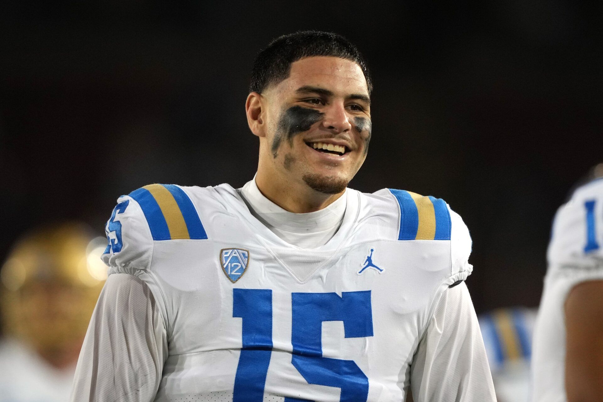 Oct 21, 2023; Stanford, California, USA; UCLA Bruins defensive lineman Laiatu Latu (15) walks on the field before the game against the Stanford Cardinal at Stanford Stadium. Mandatory Credit: Darren Yamashita-USA TODAY Sports