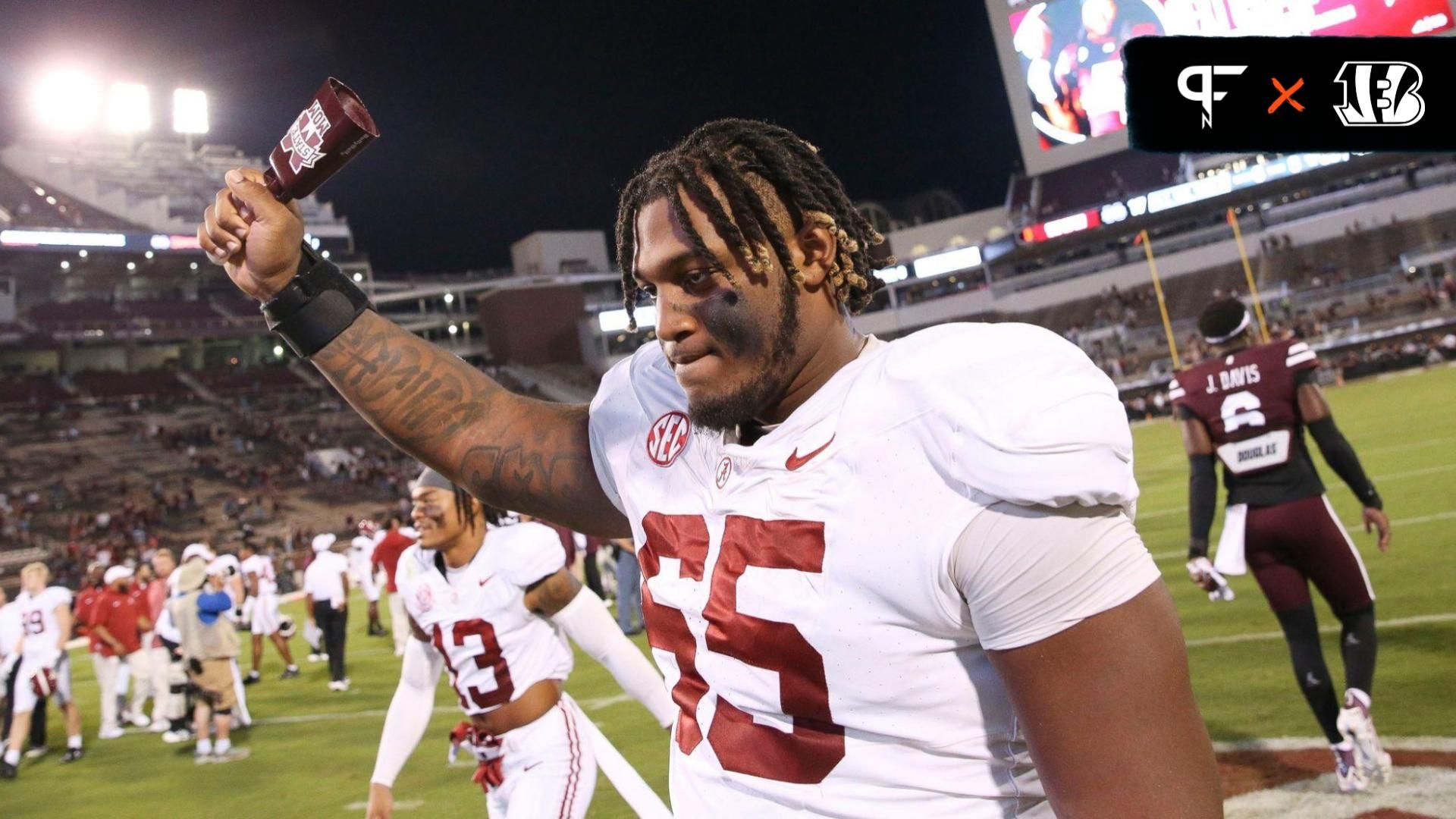 Sep 30, 2023; Starkville, Mississippi, USA; Alabama Crimson Tide offensive lineman JC Latham (65) celebrates with a cow bell in Davis Wade Stadium at Mississippi State University. Alabama defeated Mississippi State 40-17. Mandatory Credit: Gary Cosby Jr.-Tuscaloosa News