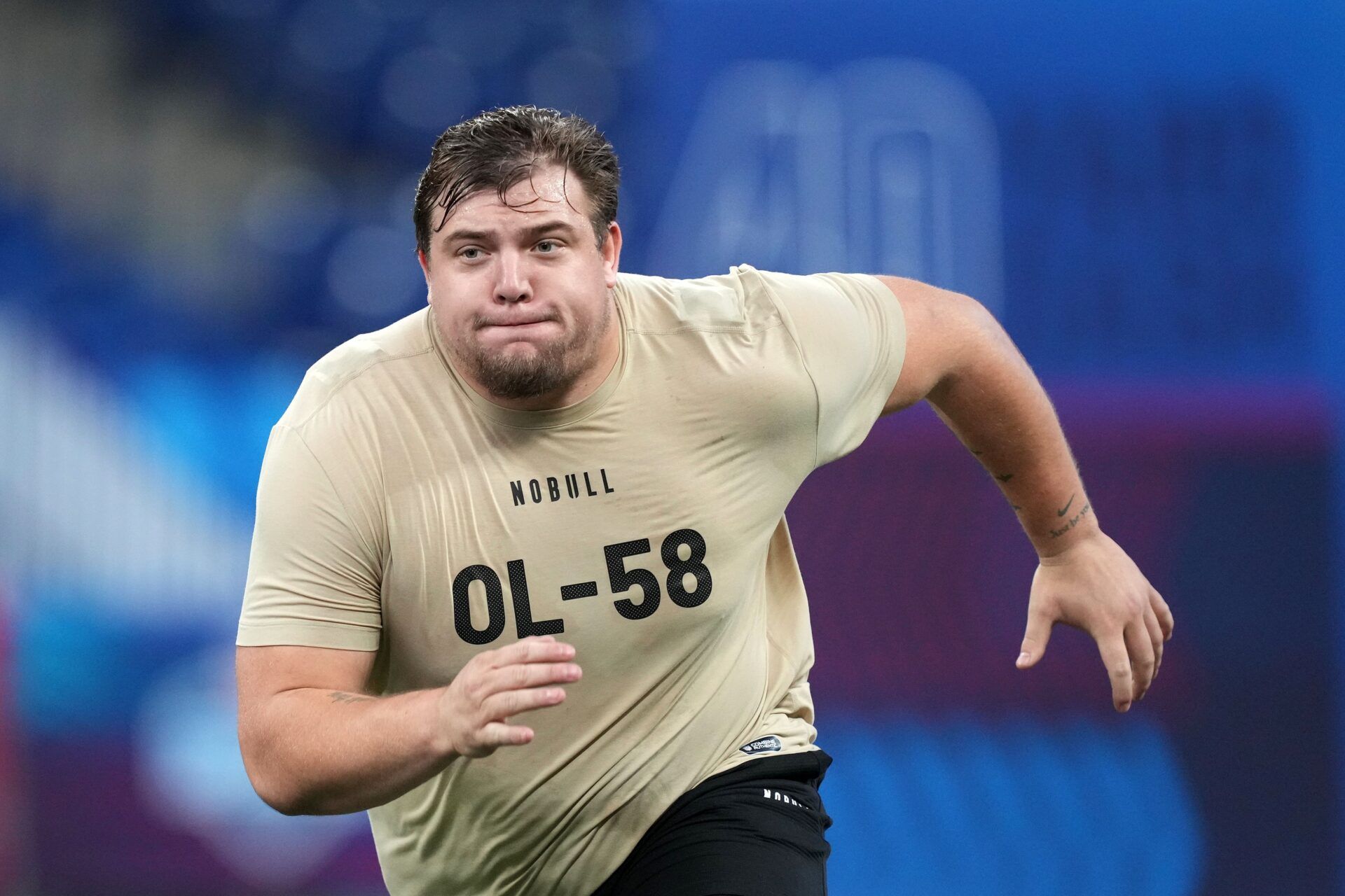 Mar 3, 2024; Indianapolis, IN, USA; Oregon offensive lineman Jackson Powers-Johnson (OL58) during the 2024 NFL Combine at Lucas Oil Stadium. Mandatory Credit: Kirby Lee-USA TODAY Sports