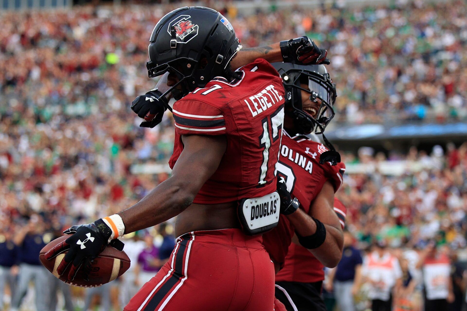 South Carolina Gamecocks wide receiver Xavier Legette (17) is congratulated by teammate wide receiver Antwane Wells Jr. (3) for his touchdown score during the first quarter of the TaxSlayer Gator Bowl of an NCAA college football game Friday, Dec. 30, 2022 at TIAA Bank Field in Jacksonville.