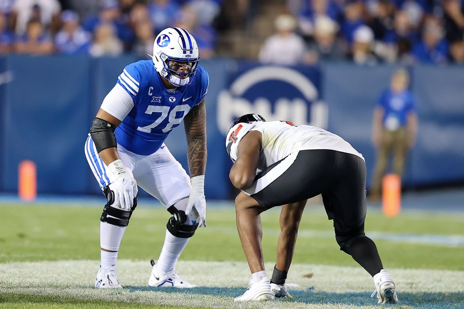 Oct 21, 2023; Provo, Utah, USA; Brigham Young Cougars offensive lineman Kingsley Suamataia (78) against Texas Tech Red Raiders linebacker Myles Cole (6) in there first half at LaVell Edwards Stadium. Mandatory Credit: Rob Gray-USA TODAY Sports