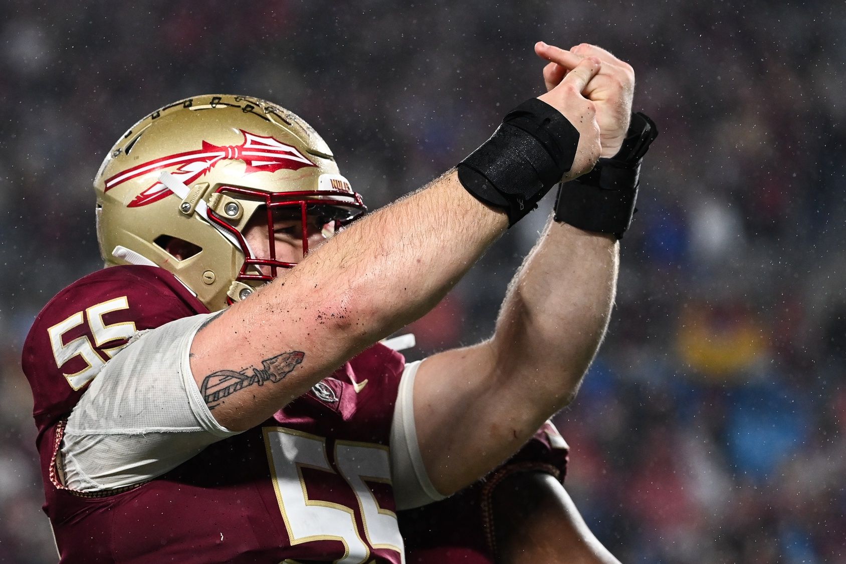 Florida State Seminoles defensive lineman Braden Fiske (55) gestures to his ring finger after sacking Louisville Cardinals quarterback Jack Plummer (not pictured) in the fourth quarter at Bank of America Stadium. Mandatory Credit: Bob Donnan-USA TODAY Sports