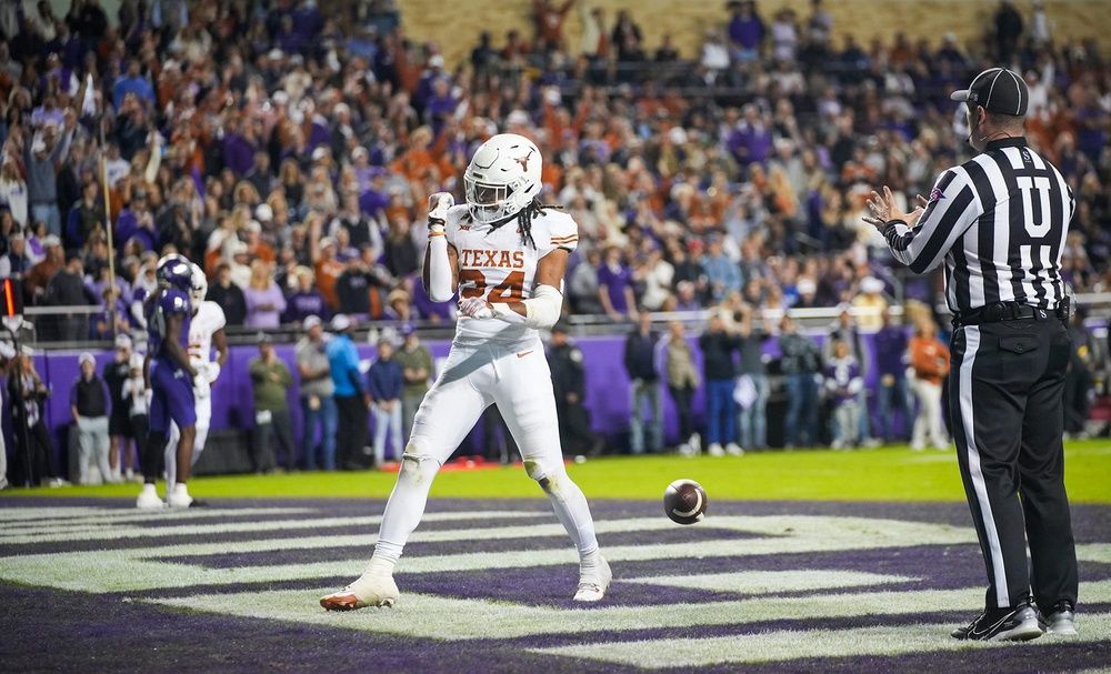 Texas Longhorns running back Jonathon Brooks (24) celebrates after he runs into the end zone for a touchdown against TCU Horned Frogs in the first quarter of an NCAA college football game, Saturday, November. 11, 2023, at Amon G. Carter Stadium in Fort Worth, Texas.