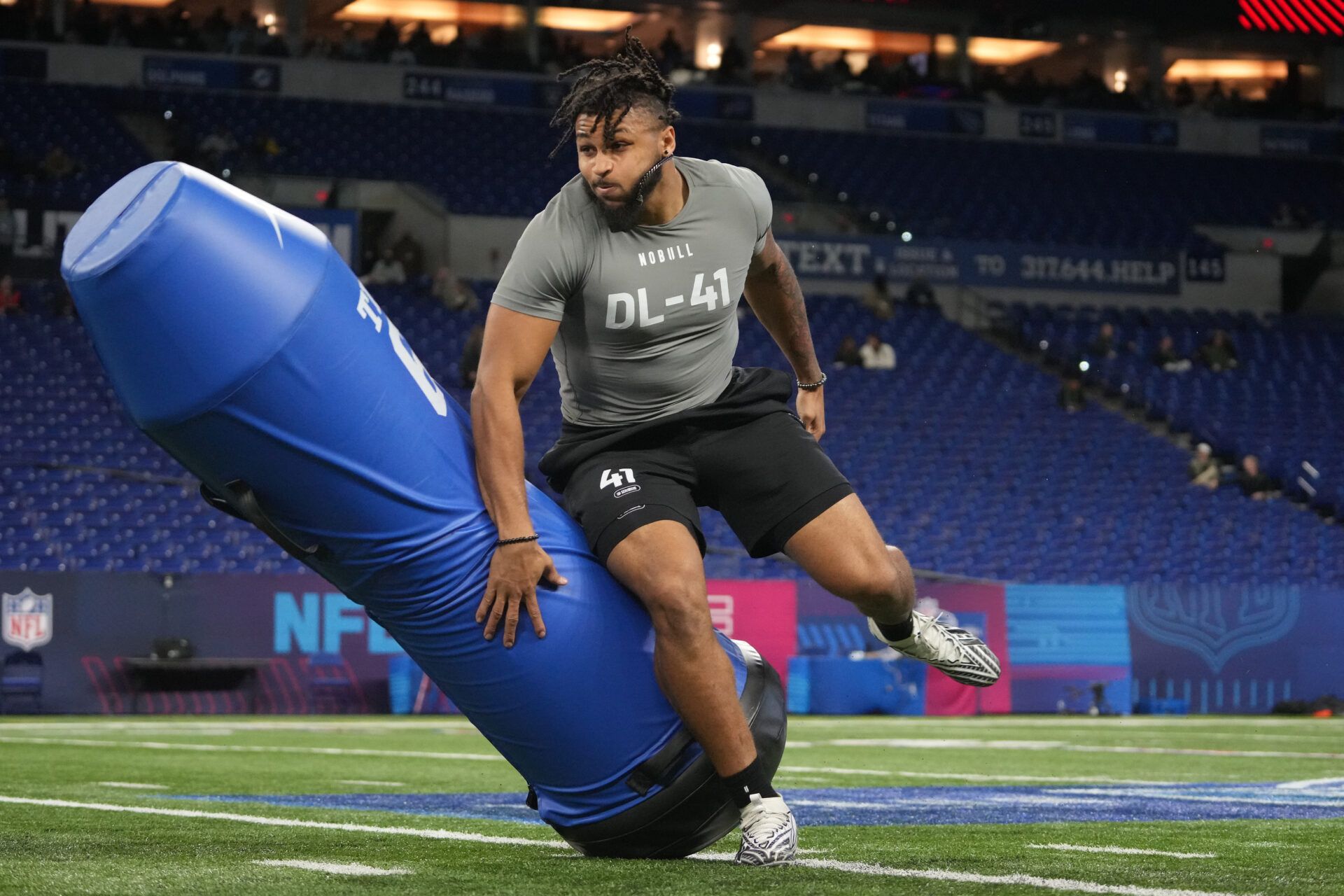 Western Michigan defensive lineman Marshawn Kneeland (DL41) works out during the 2024 NFL Combine at Lucas Oil Stadium.