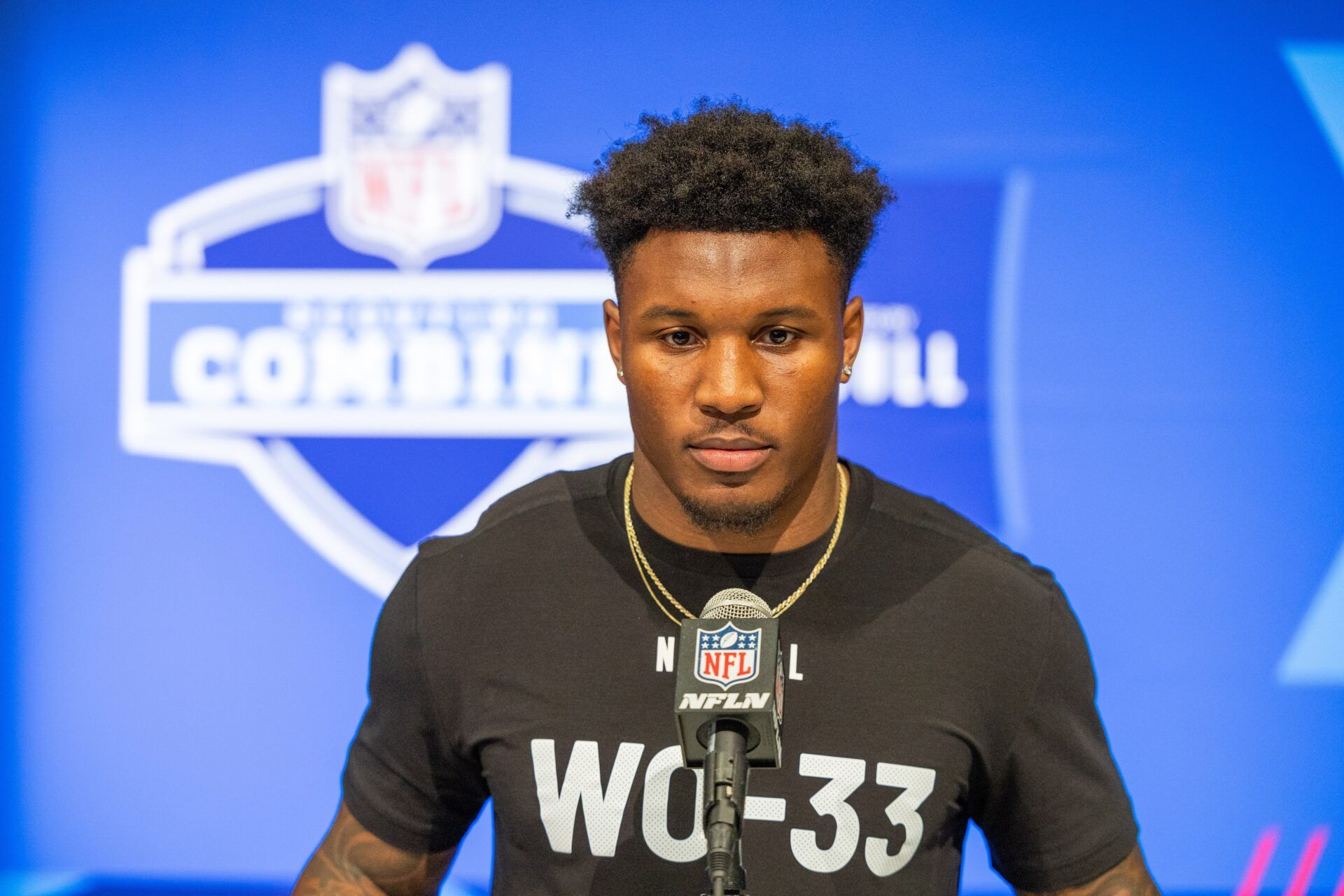 VIRGINIA wide receiver Malik Washington (WO33) talks to the media during the 2024 NFL Combine at Lucas Oil Stadium.