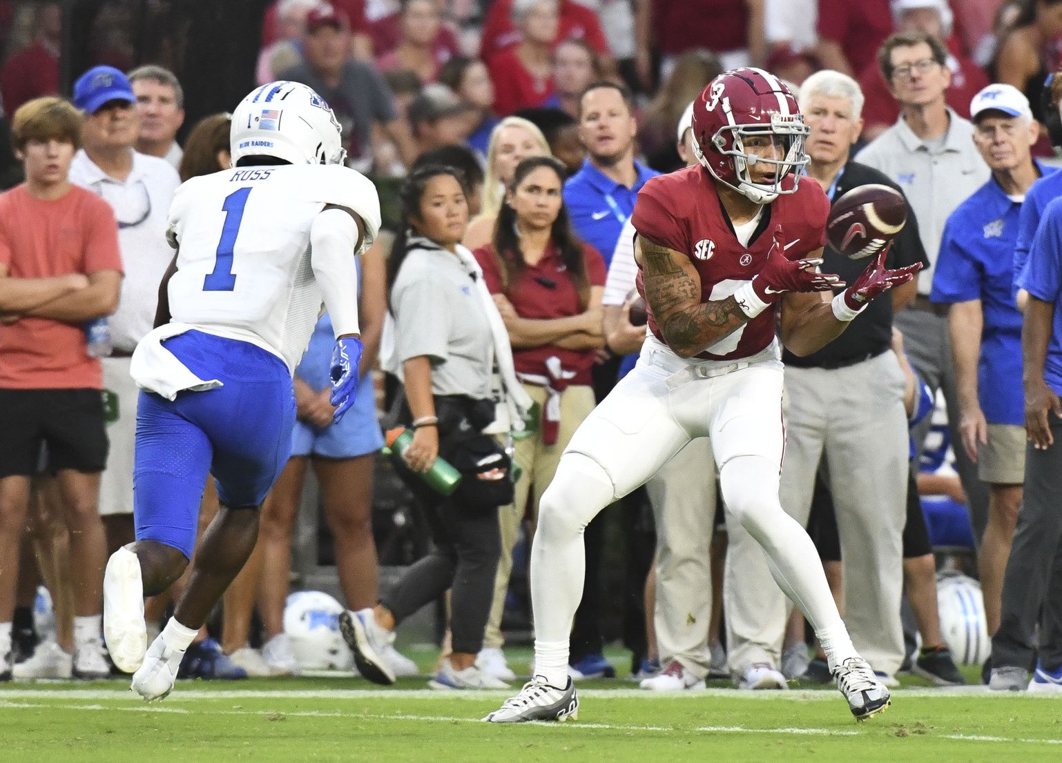 Middle Tennessee State Blue Raiders DB Teldrick Ross (1) gets set to tackle Alabama Crimson Tide WR Jermaine Burton (3).