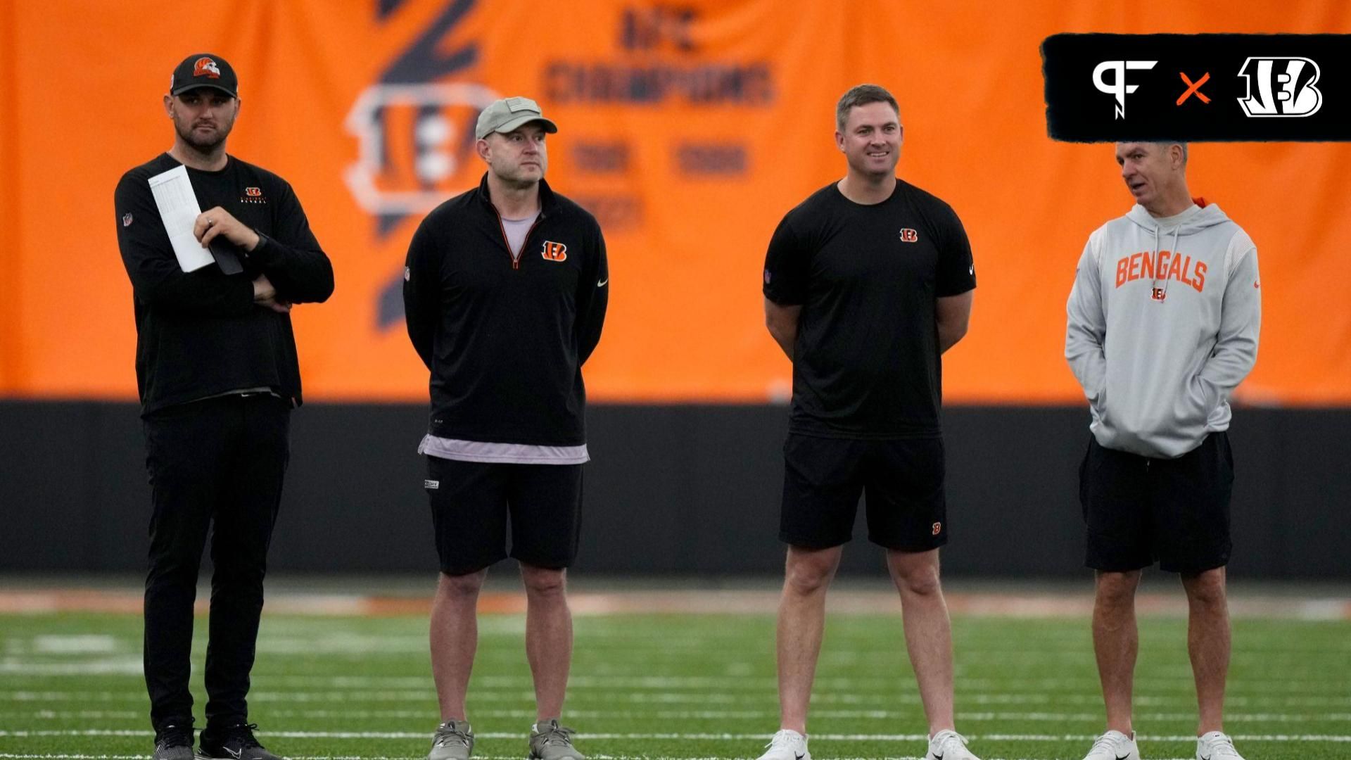 Director of college scouting Mike Potts far left) and director of player personnel Duke Tobin (left) and head coach Zac Taylor (right) and defensive coordinator Lou Anarumo (far right) talk as rookie...