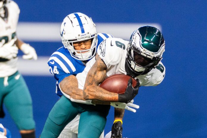 Philadelphia Eagles wide receiver DeVonta Smith (6) runs with the ball while Indianapolis Colts cornerback Isaiah Rodgers (34) defends at Lucas Oil Stadium.