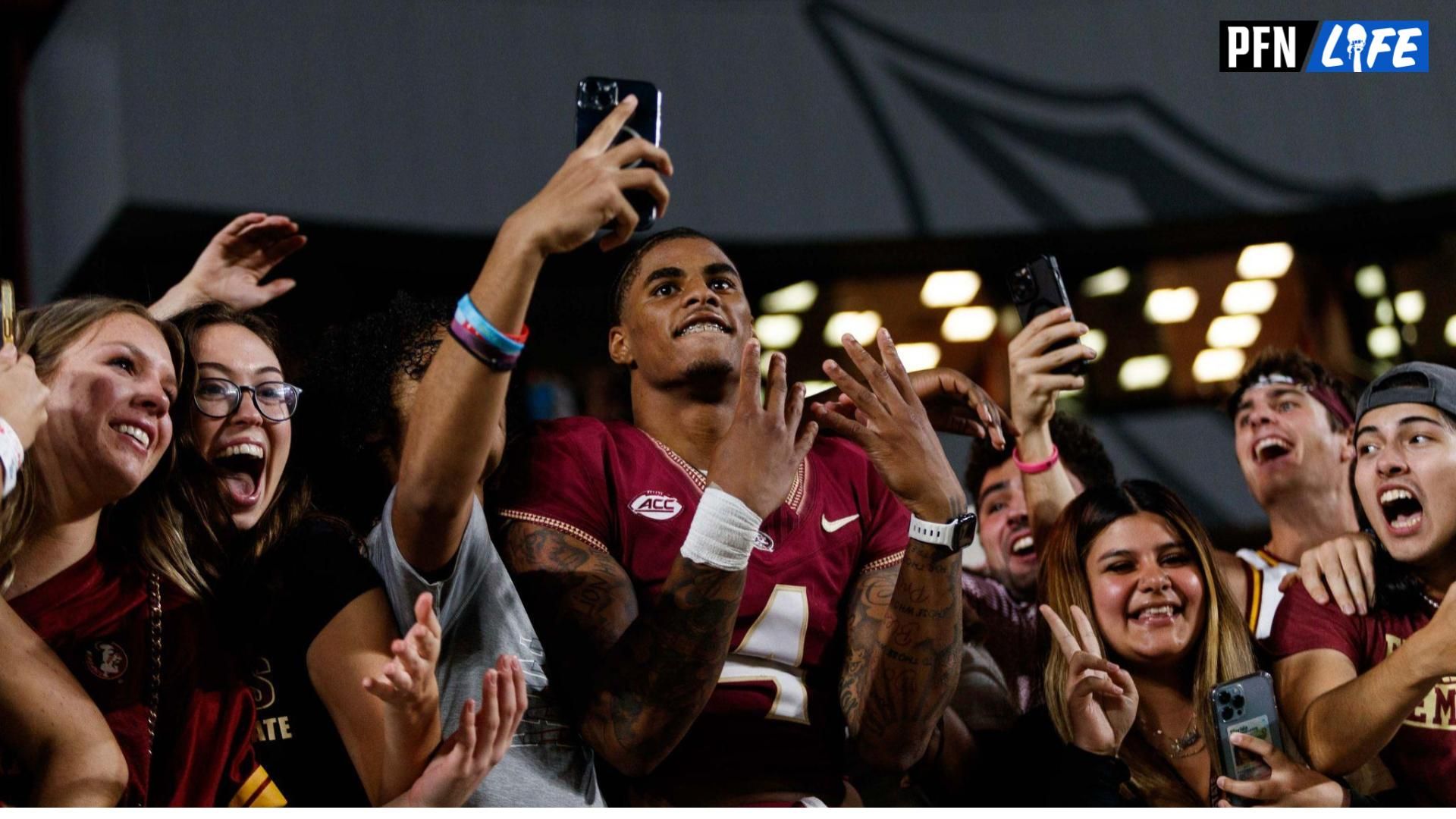 Florida State Seminoles wide receiver Keon Coleman (4) celebrates the win against the North Alabama Lions with fans at Doak S. Campbell Stadium. Mandatory Credit: Morgan Tencza-USA TODAY Sports