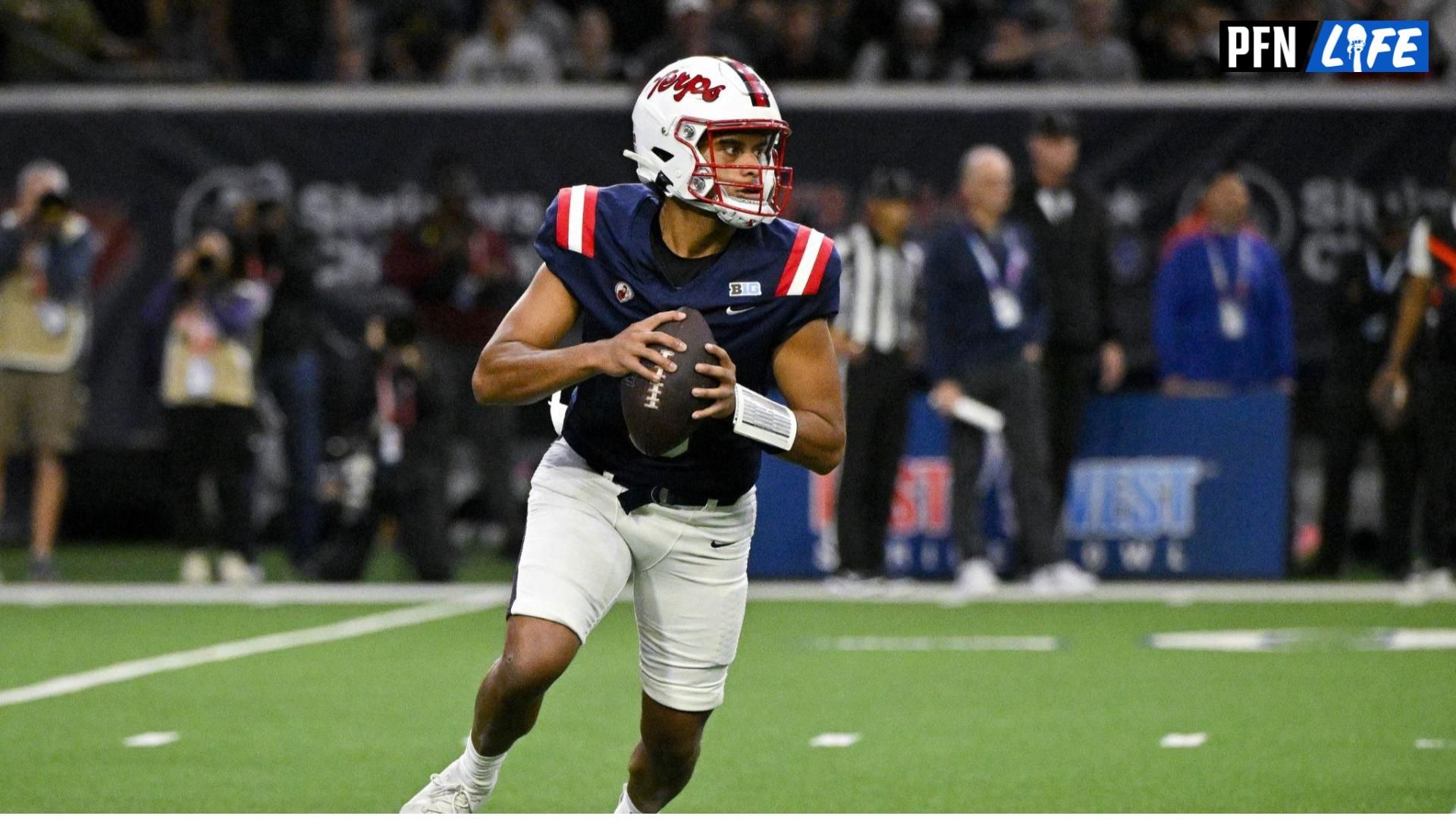 West quarterback Taulia Tagovailoa of Maryland (5) runs with the ball during the first half against the East at the Ford Center at The Star. Mandatory Credit: Jerome Miron-USA TODAY Sports