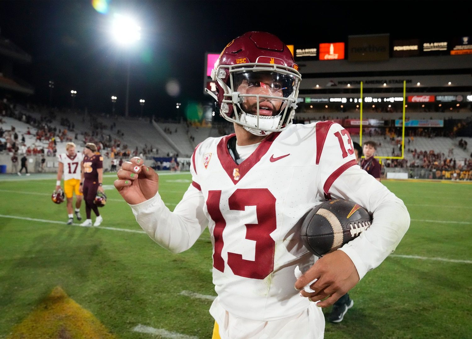 USC Trojans QB Caleb Williams (13) leaves the field after a win over Arizona State.