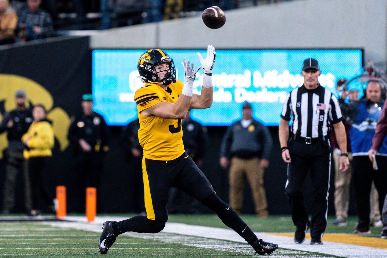 Iowa Hawkeyes DB Cooper DeJean (3) catches a punt.