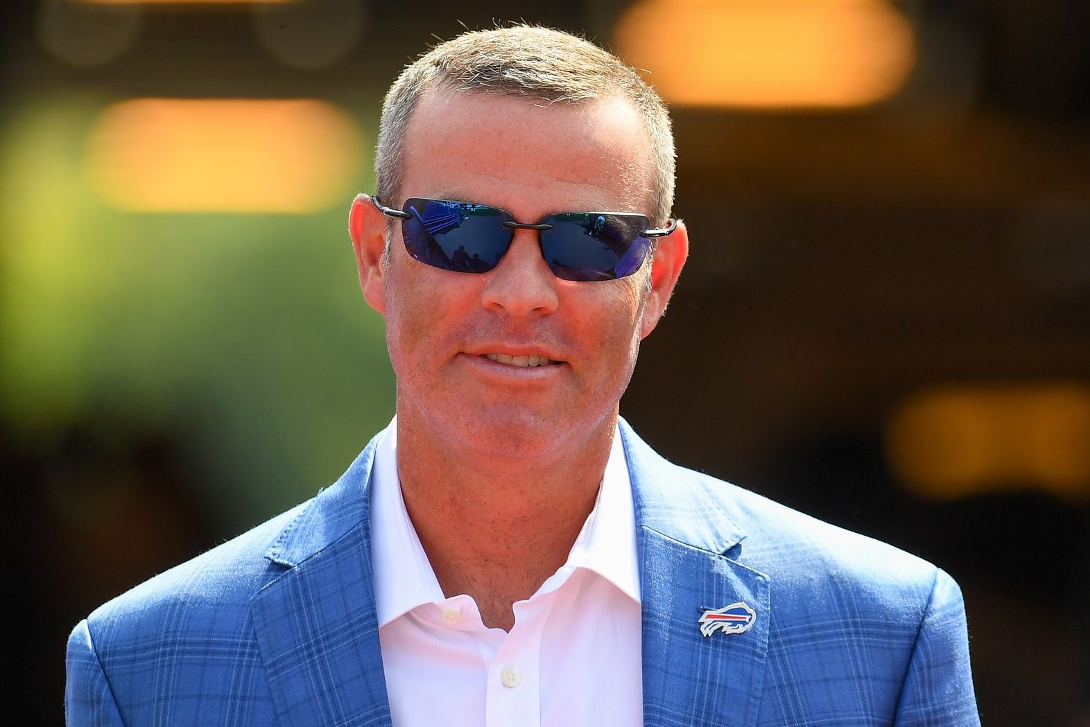 Buffalo Bills general manager Brandon Beane walks to the field prior to the game against the Green Bay Packers at Highmark Stadium.