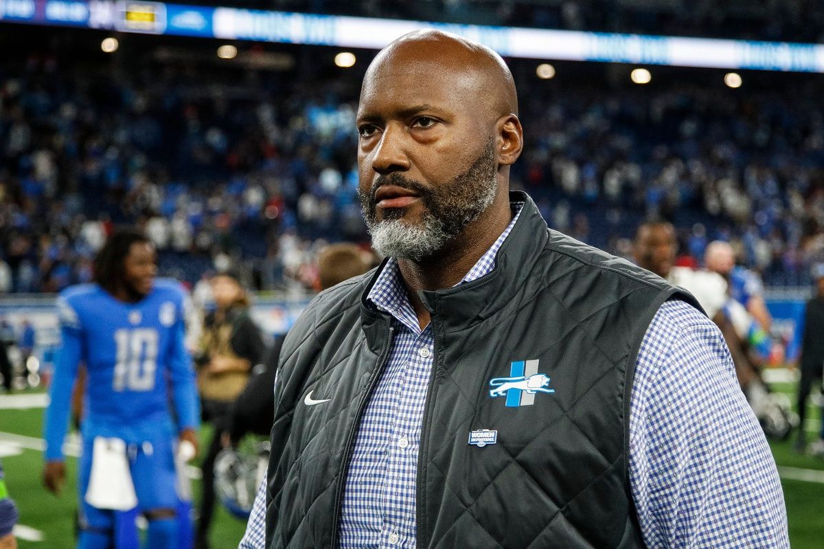 Detroit Lions GM Brad Holmes walks off the field after a win over the Atlanta Falcons.