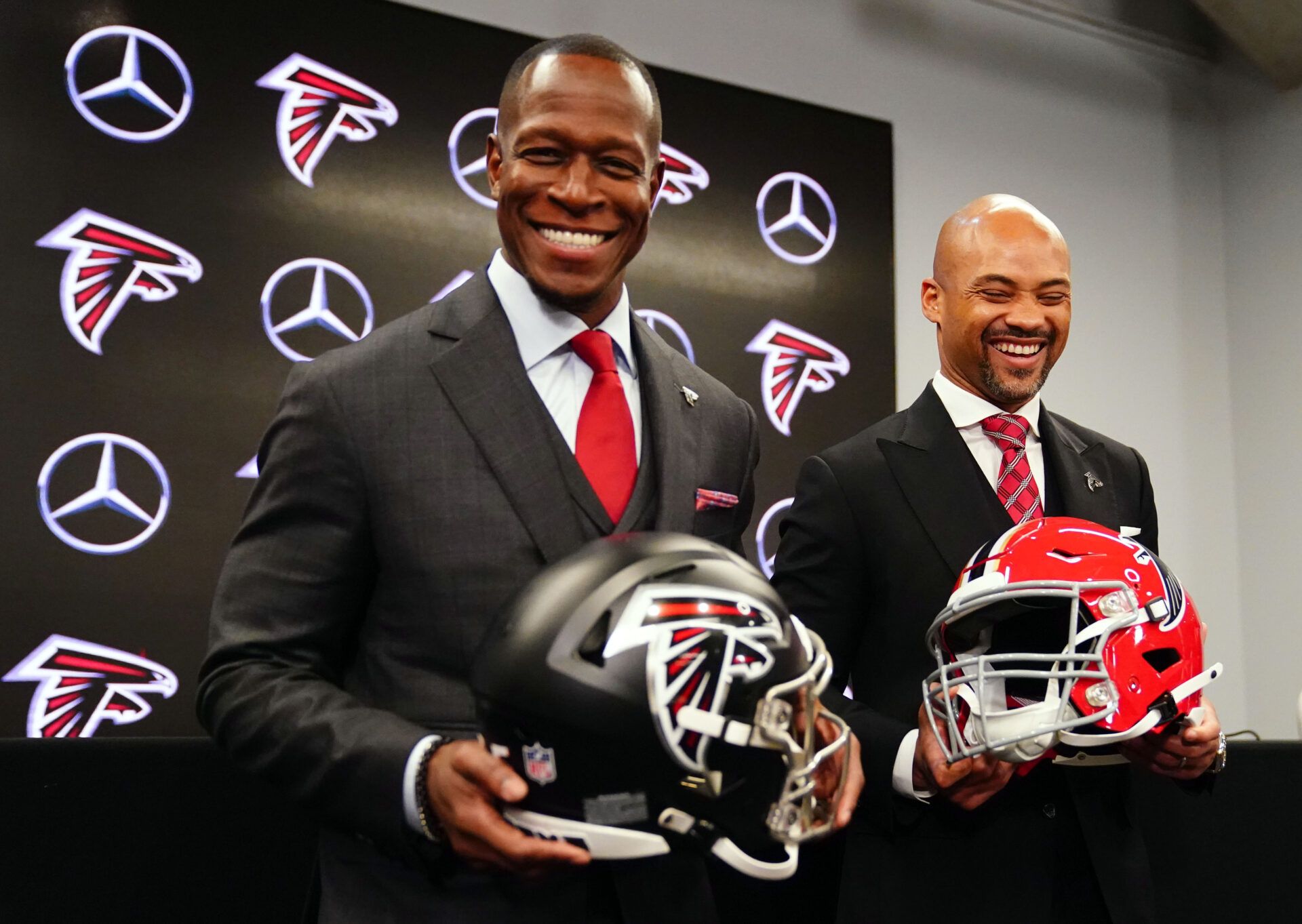 Atlanta Falcons head coach Raheem Morris and general manager Terry Fontenot pose for the media after Morris was introduced as the head coach of the Atlanta Falcons at Mercedes-Benz Stadium.