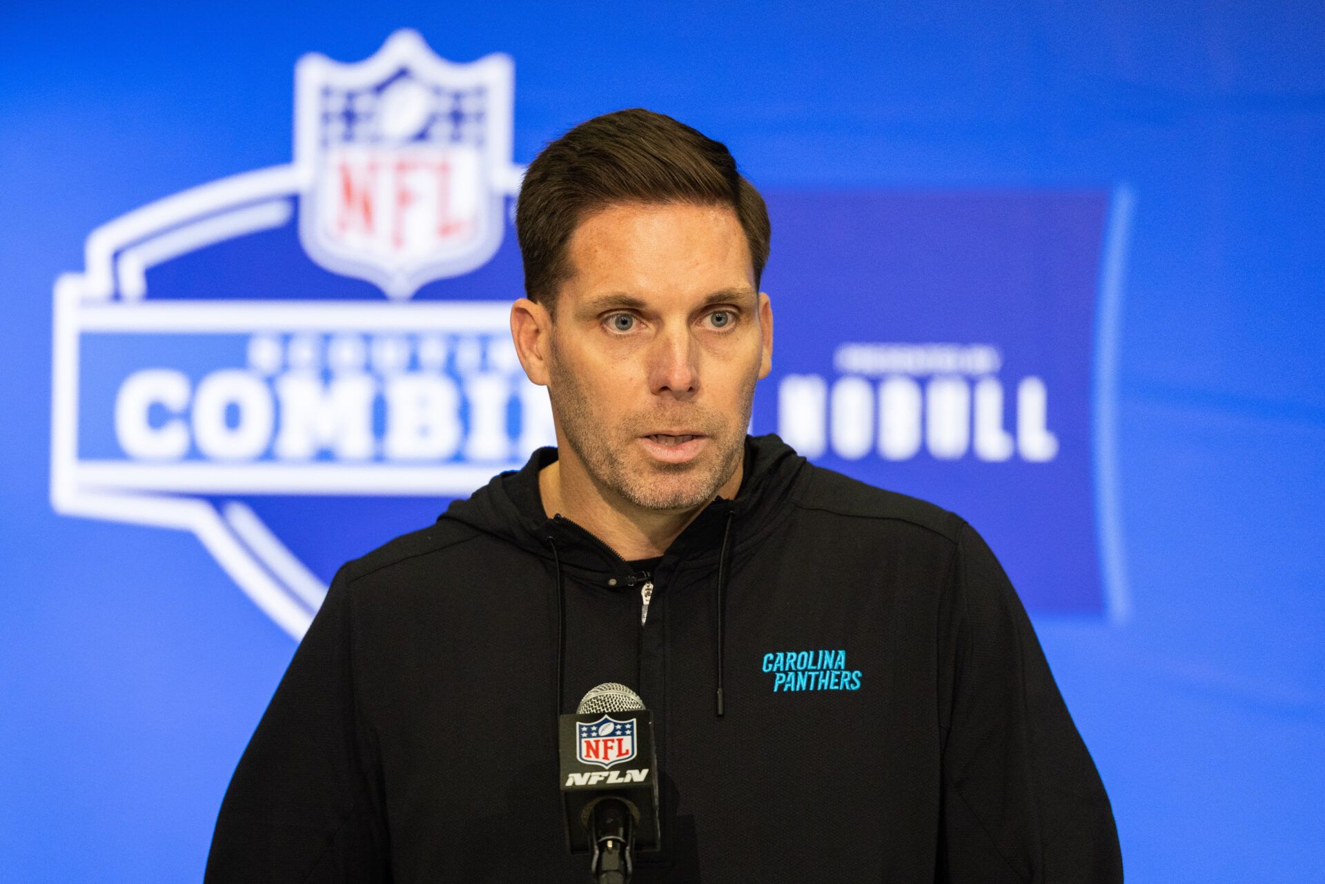 Carolina Panthers President of Football Operations/General Manager Dan Morgan talks to the media at the 2024 NFL Combine at Indiana Convention Center.