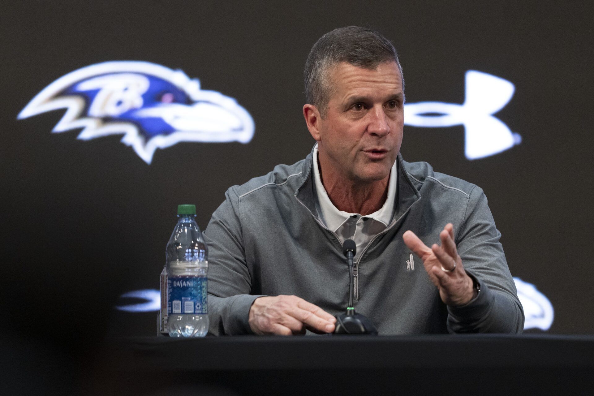 Baltimore Ravens head coach John Harbaugh answers questions during a press conference at Under Armour Performance Center.