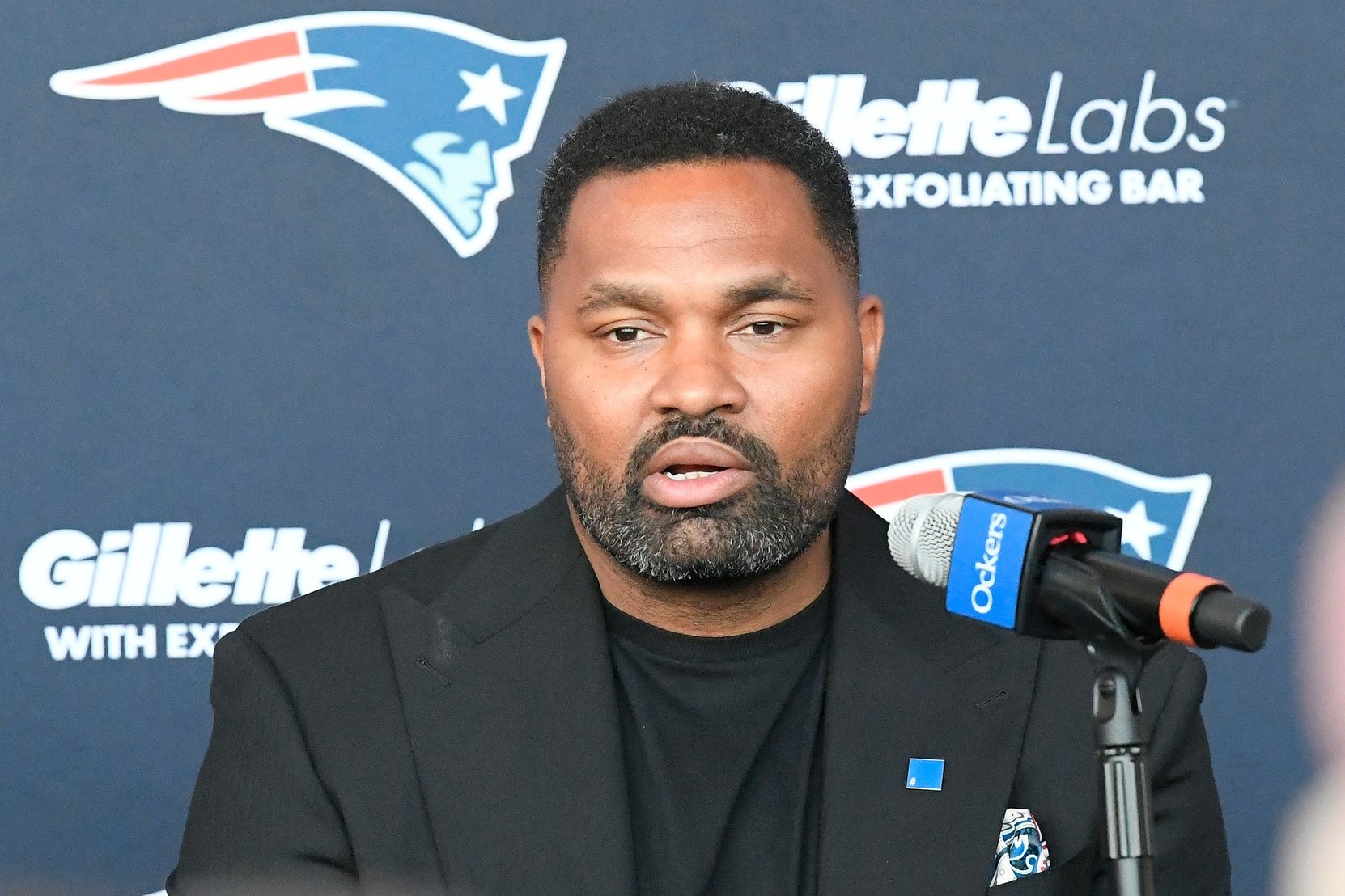 New England Patriots head coach Jerod Mayo talks to the media during a press conference.