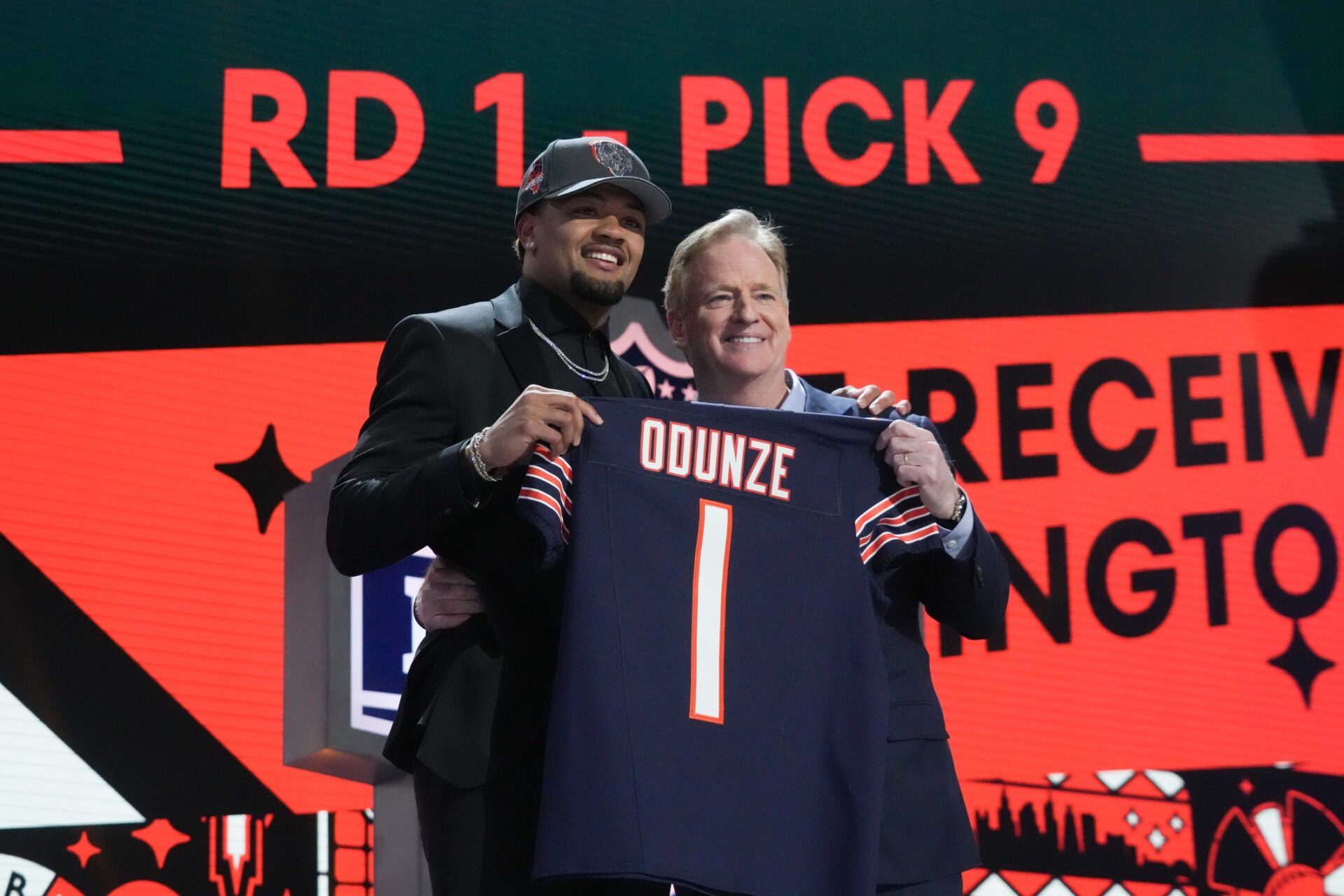 Washington Huskies wide receiver Rome Odunze poses with NFL commissioner Roger Goodell after being selected by the Chicago Bears as the No. 8 pick in the first round of the 2024 NFL Draft at Campus Martius Park and Hart Plaza. Mandatory Credit: Kirby Lee-USA TODAY Sports