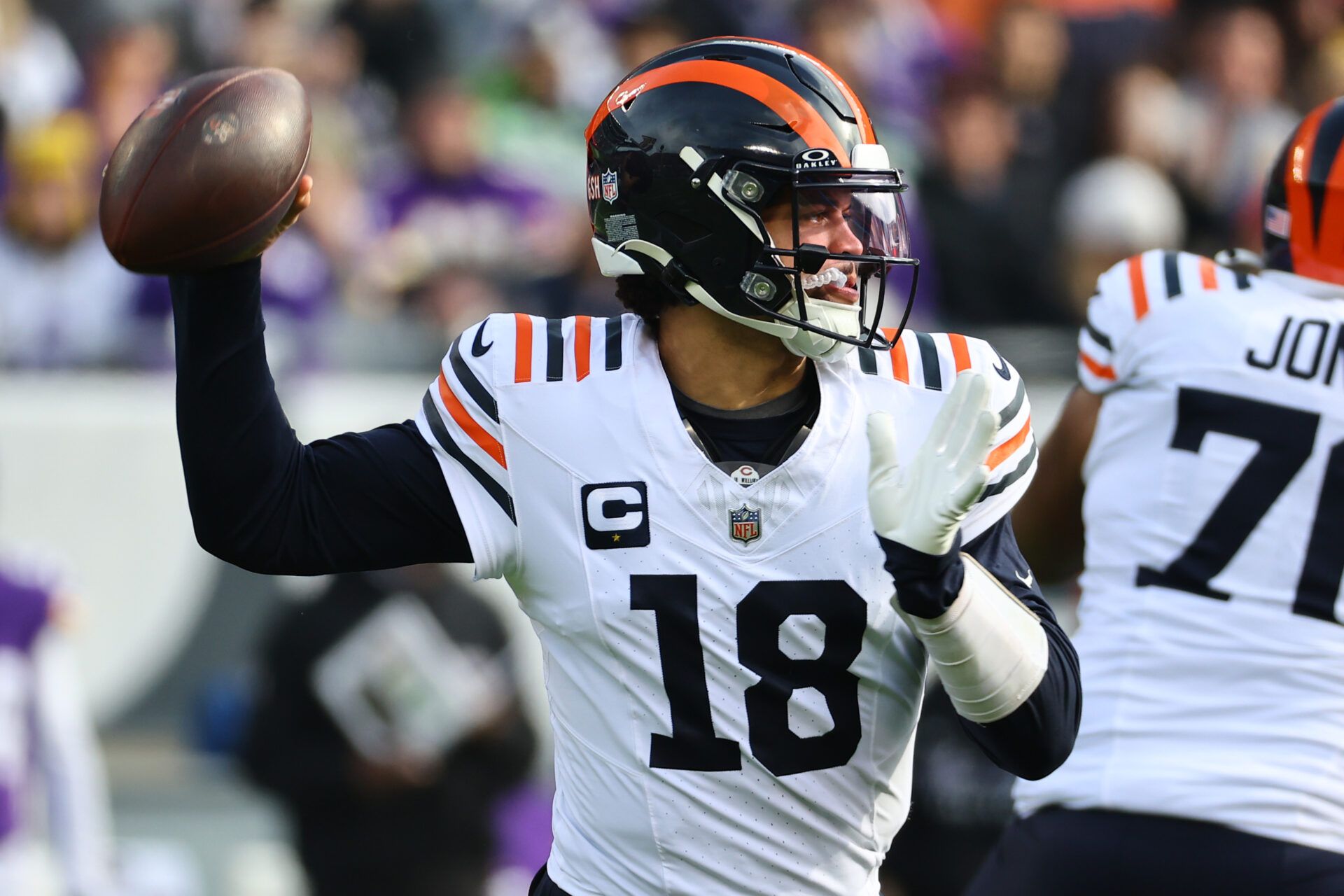 Chicago Bears quarterback Caleb Williams (18) drops back to pass against the Minnesota Vikings during the first quarter at Soldier Field. Mandatory Credit: Mike Dinovo-Imagn Images