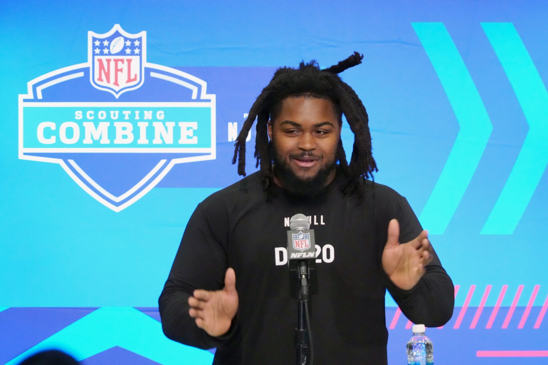 Illinois defensive lineman Johnny Newton (DL20) speaks at a press conference at the NFL Scouting Combine at Indiana Convention Center.