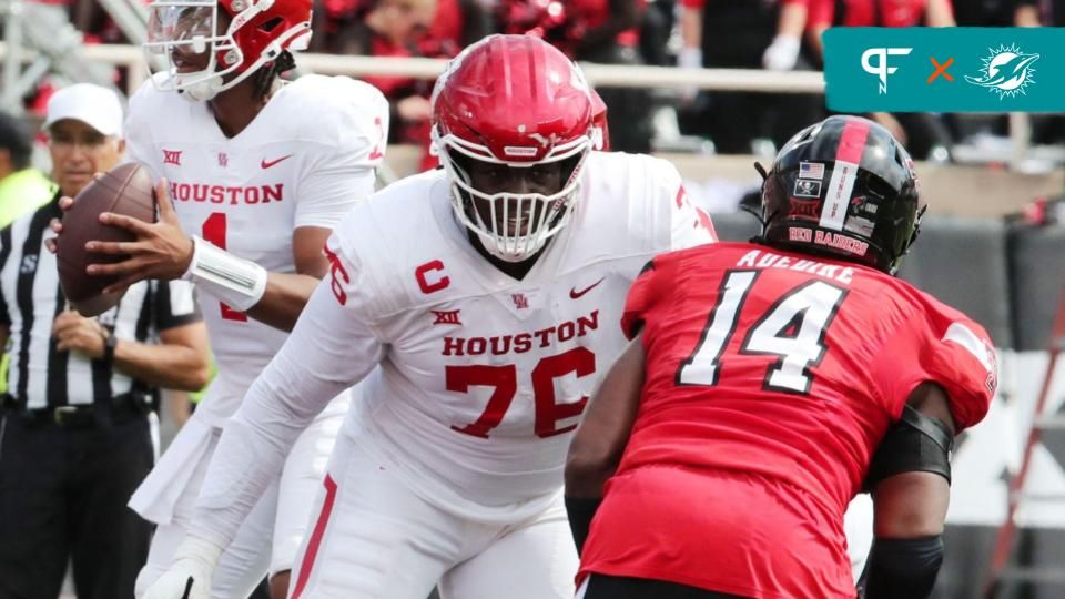 Houston Cougars offensive tackle Patrick Paul (76) blocks Texas Tech Red Raiders defensive end Joseph Adedire (14) in the second half at Jones AT&T Stadium and Cody Campbell Field.