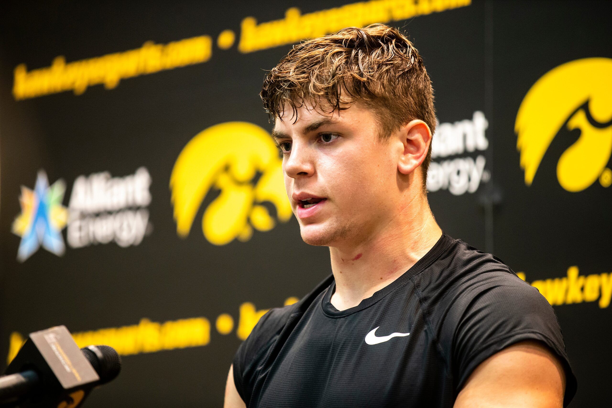 Iowa defensive back Cooper DeJean speaks to reporters after a NCAA football game against Nevada, Sunday, Sept. 18, 2022, at Kinnick Stadium in Iowa City, Iowa.