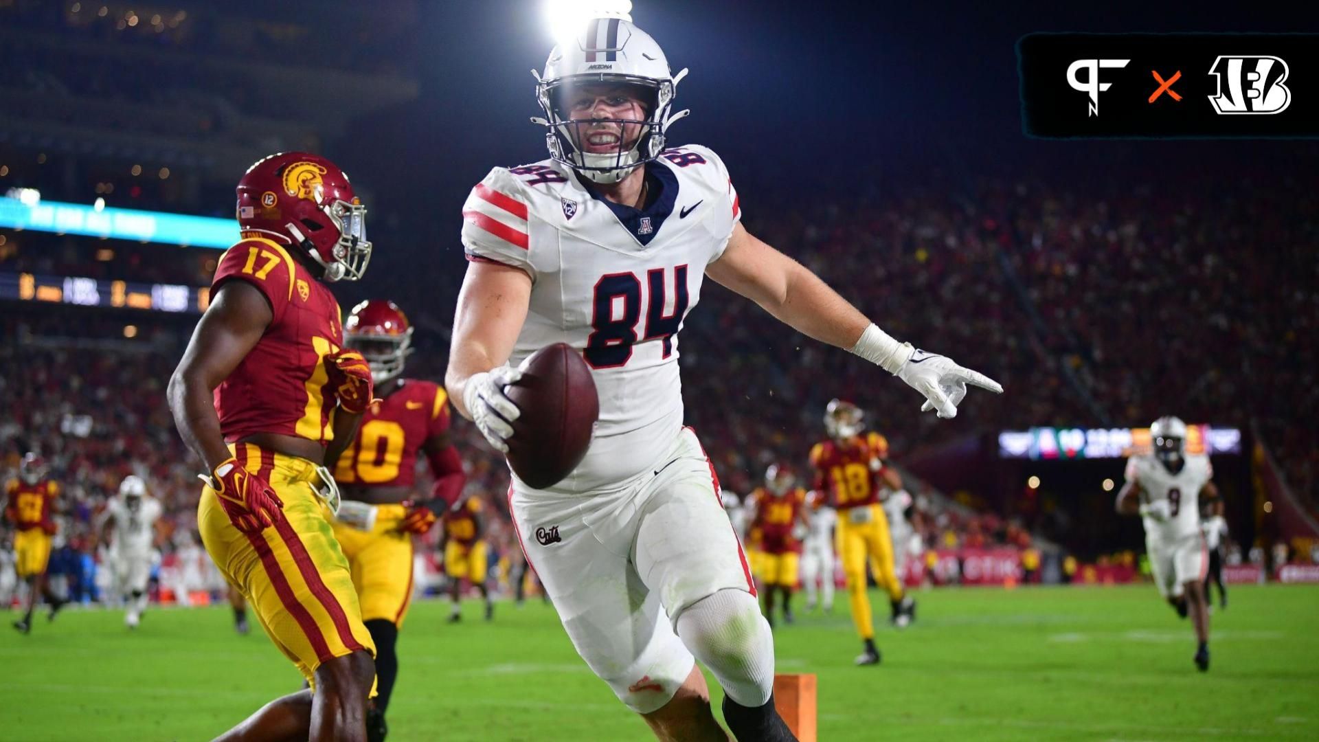 Arizona Wildcats tight end Tanner McLachlan (84) scores a touchdown against the Southern California Trojans during the first half at Los Angeles Memorial Coliseum.