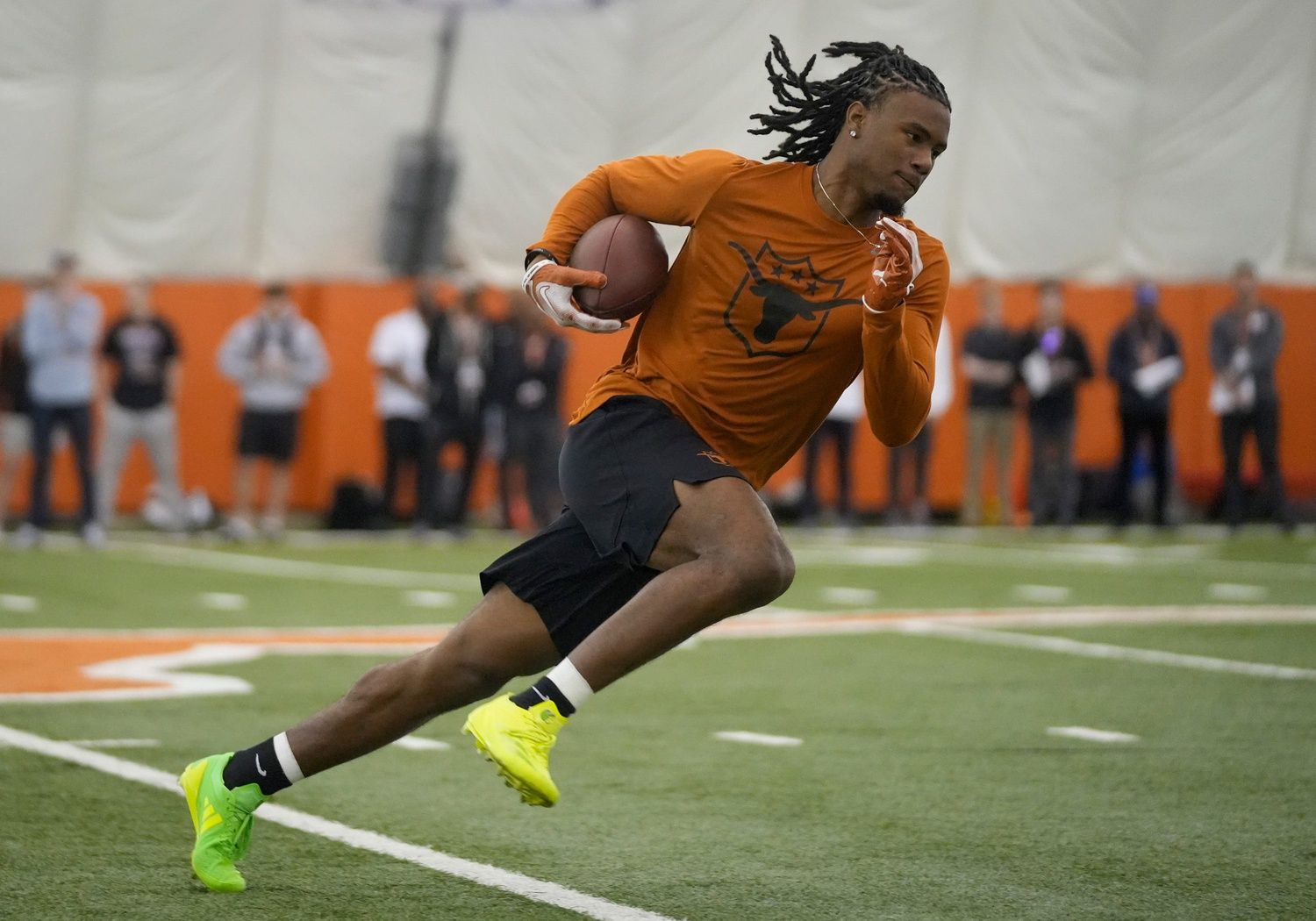 Wide receiver Adonai Mitchell goes through drills at Texas Longhorns Football Pro Day.