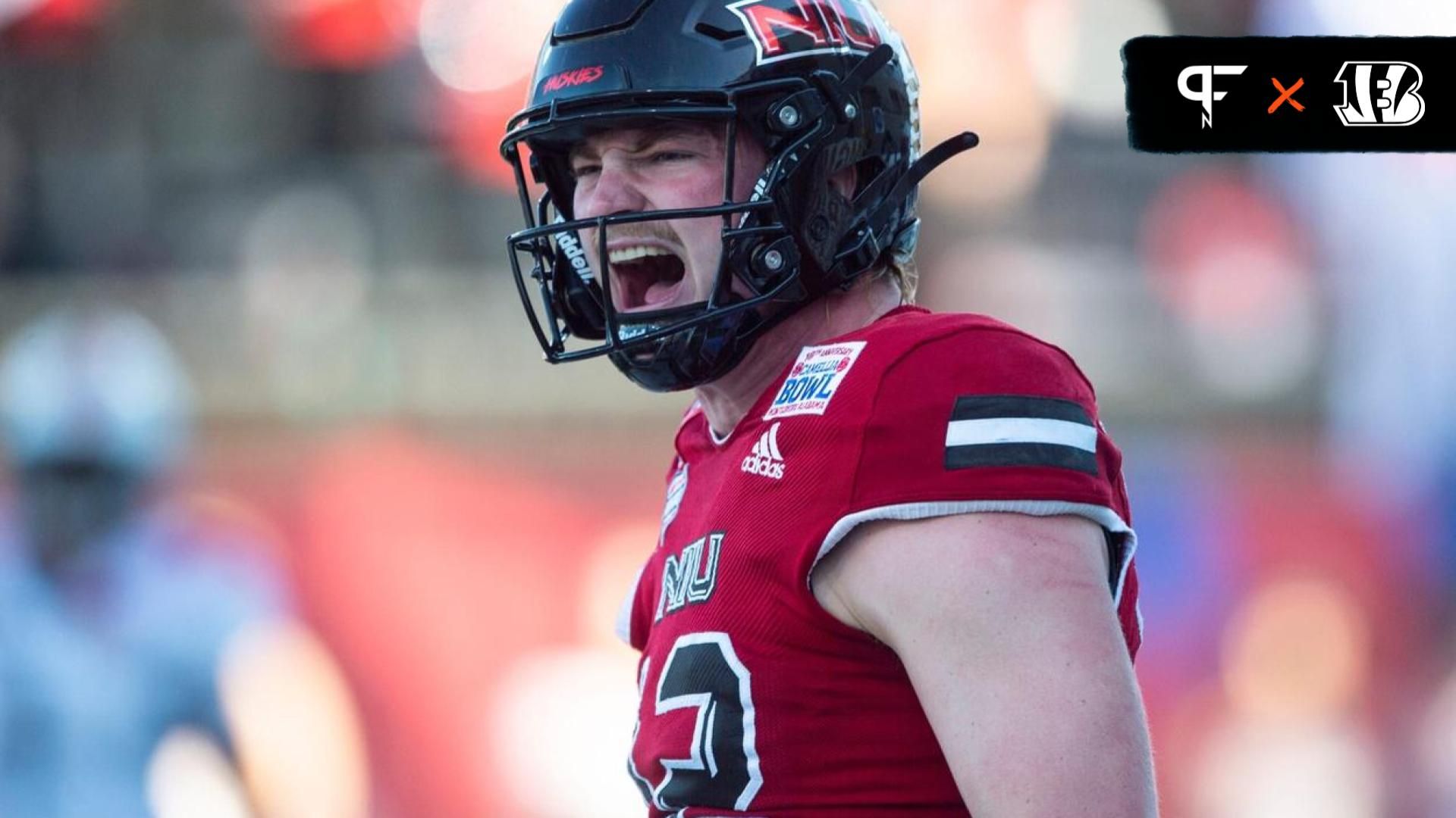 Northern Illinois Huskies QB Rocky Lombardi (12) celebrates a touchdown against the Arkansas State Red Wolves.