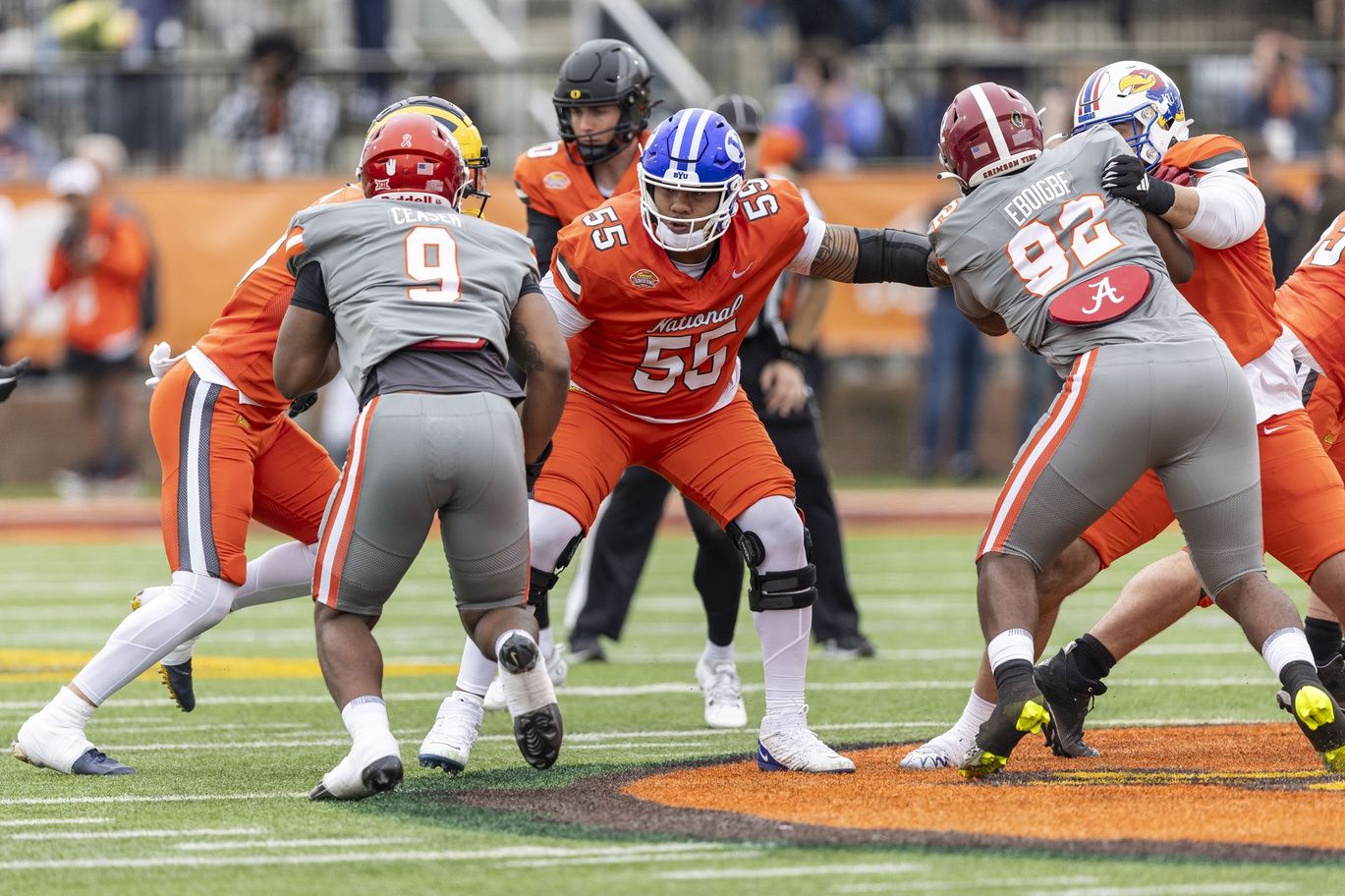 National offensive lineman Kingsley Suamataia of BYU (55) blocks during the first half of the 2024 Senior Bowl football game at Hancock Whitney Stadium.