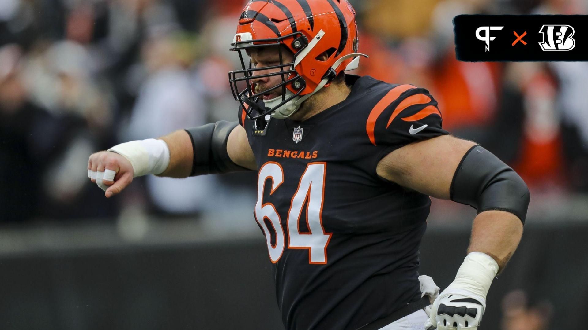 Cincinnati Bengals center Ted Karras (64) runs onto the field before the game against the Cleveland Browns at Paycor Stadium.