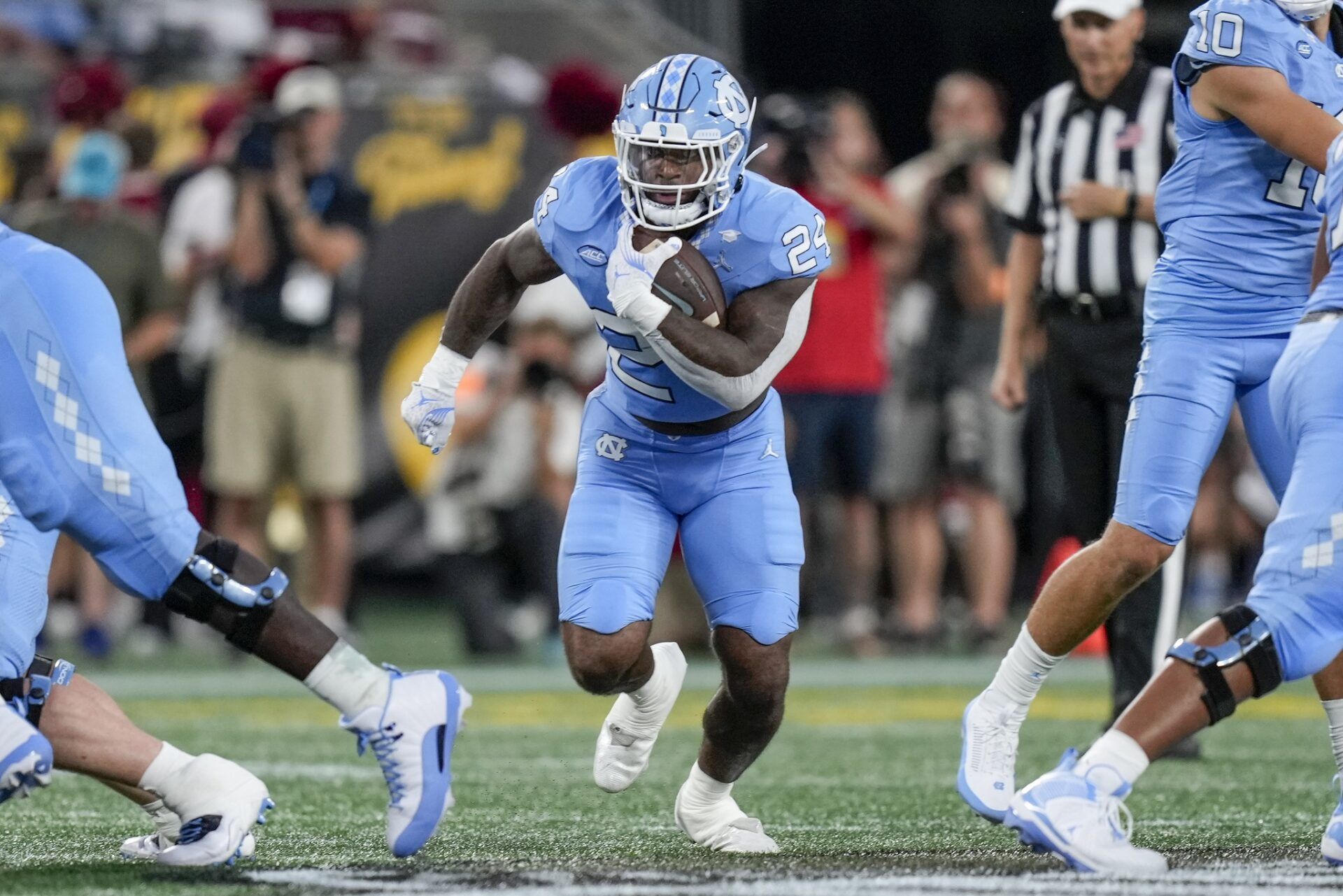 North Carolina Tar Heels running back British Brooks (24) runs for yardage against the South Carolina Gamecocks during the first quarter at Bank of America Stadium.