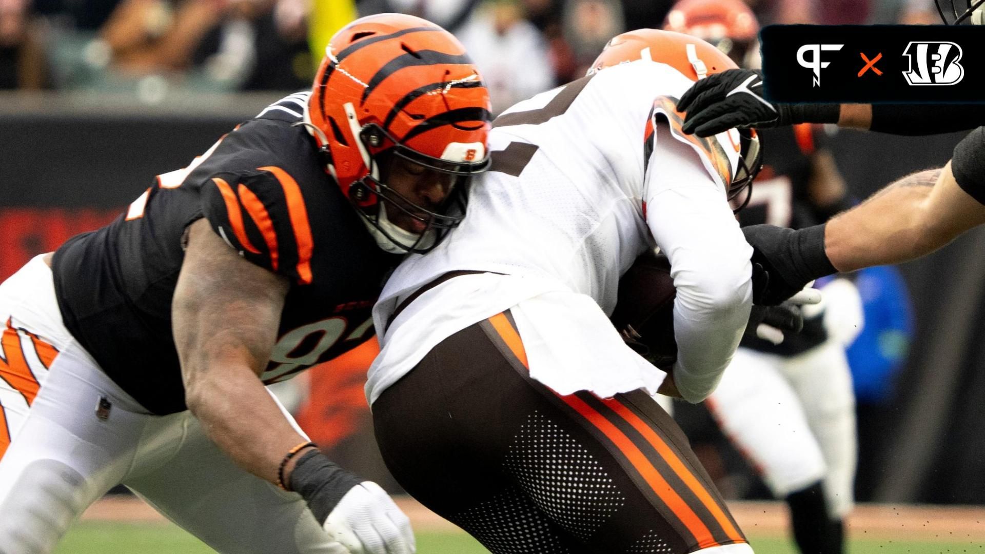 Cincinnati Bengals defensive tackle B.J. Hill (92) tackles Cleveland Browns quarterback Jeff Driskel (12).