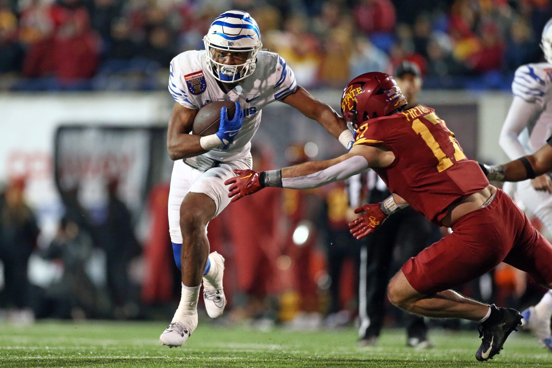 Memphis Tigers RB Blake Watson (4) runs the ball against the Iowa State Cyclones.