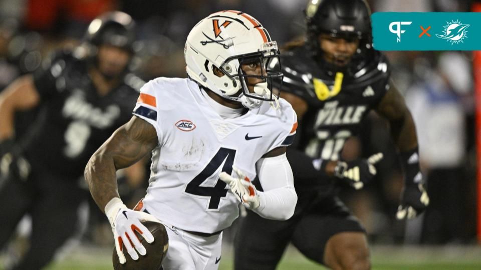 Virginia Cavaliers WR Malik Washington (4) runs the ball against the Louisville Cardinals.