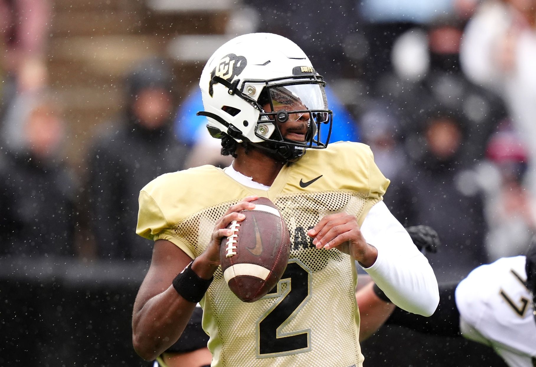 Colorado Buffaloes QB Shedeur Sanders (2) looks to throw at a spring game.