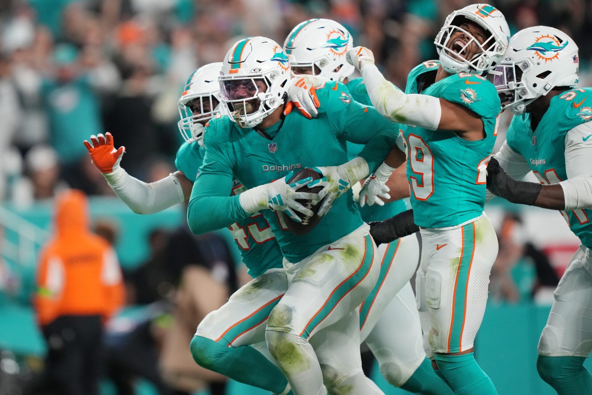 Miami Dolphins linebacker Bradley Chubb (2) celebrates recovering a fumble against the Tennessee Titans during the second half of an NFL game at Hard Rock Stadium in Miami Gardens, Dec. 11, 2023.